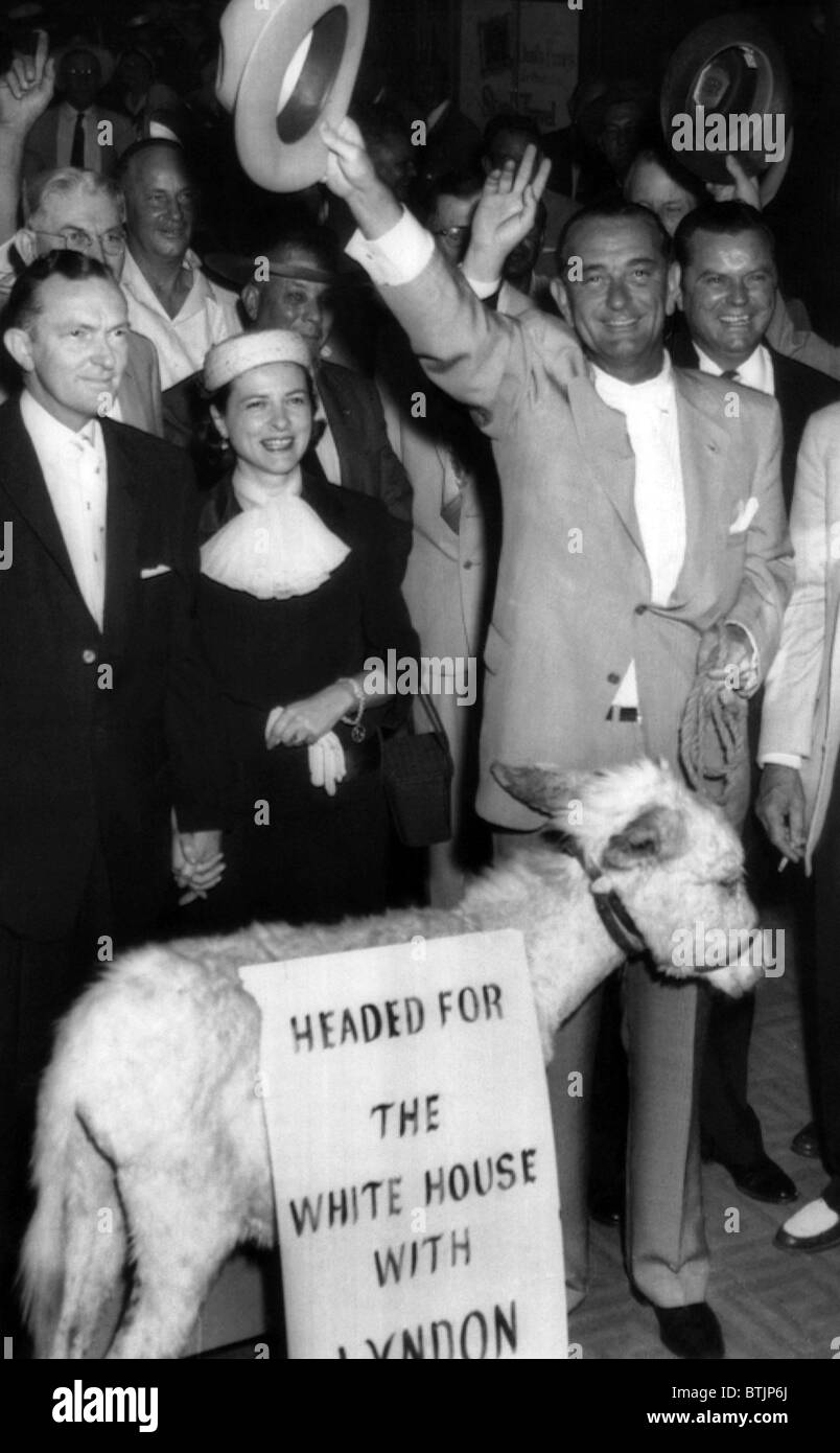 Senator Lyndon B. Johnson with Mr. and Mrs.Sam Houston Johnson (on left) surrounded by supporters during an impromtu rally prior Stock Photo