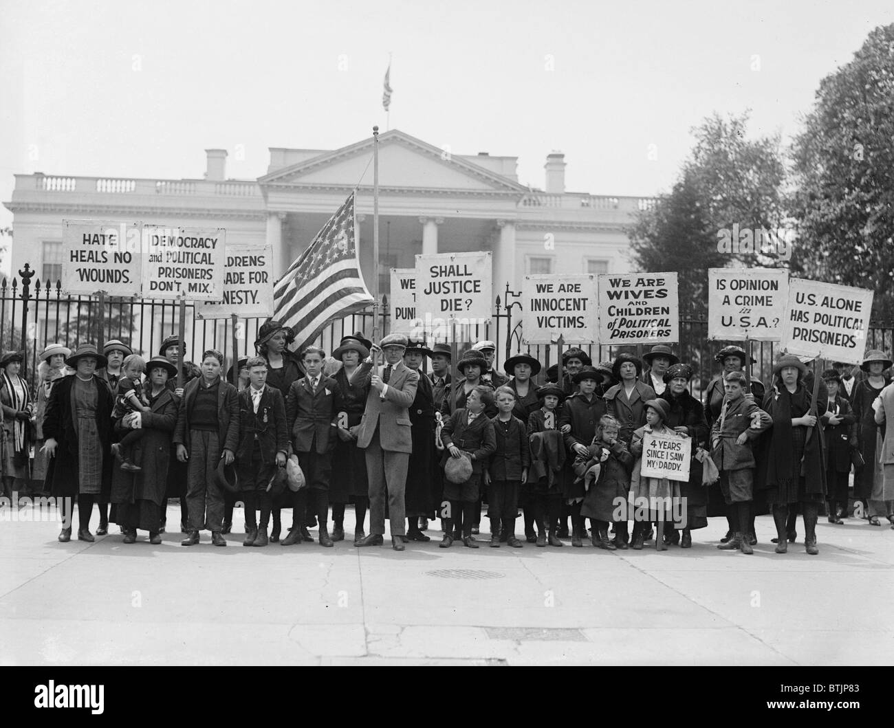 The Espionage Act of 1917 and Sedition Act of 1918 outlawed the use 'disloyal, profane, scurrilous, or abusive language' about the United States government, flag, or armed forces during World War 1. In 1922 the children of imprisoned dissidents protested for their release. Stock Photo