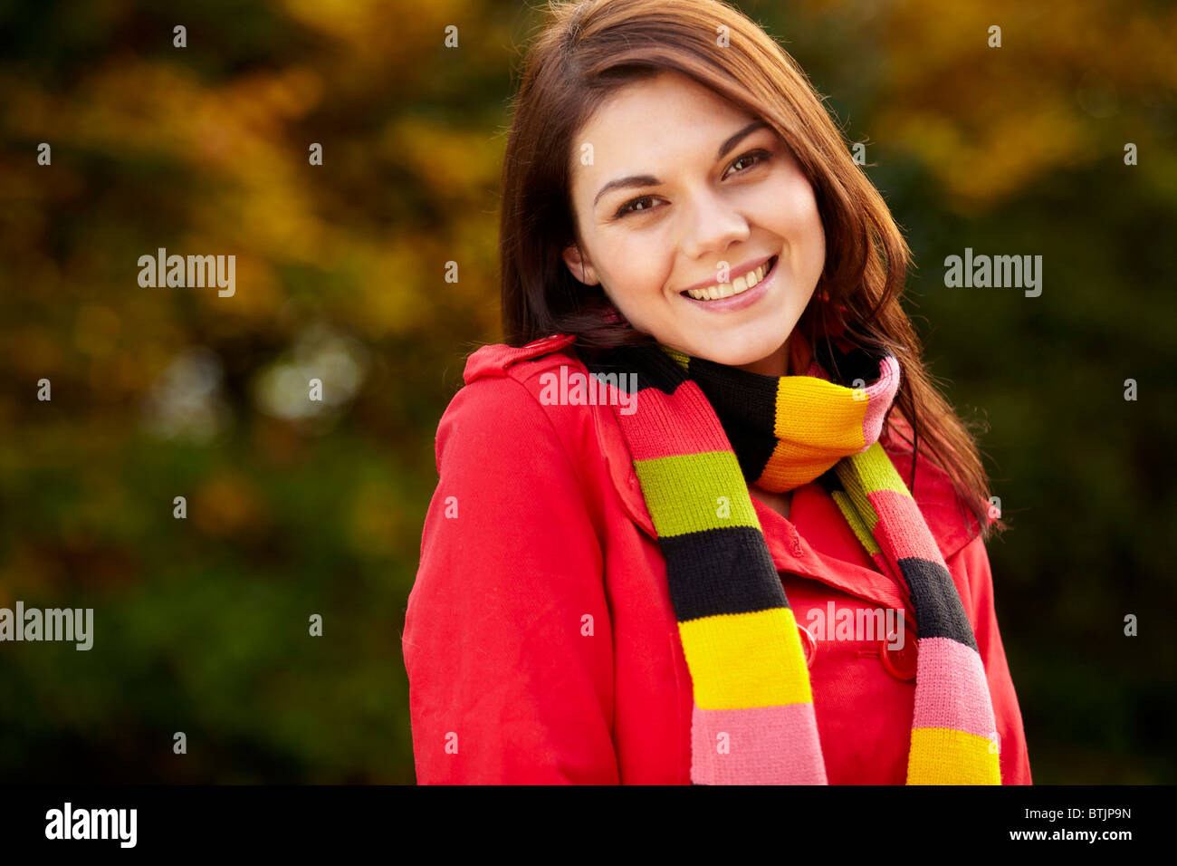 Girl wearing coat hi-res stock photography and images - Alamy
