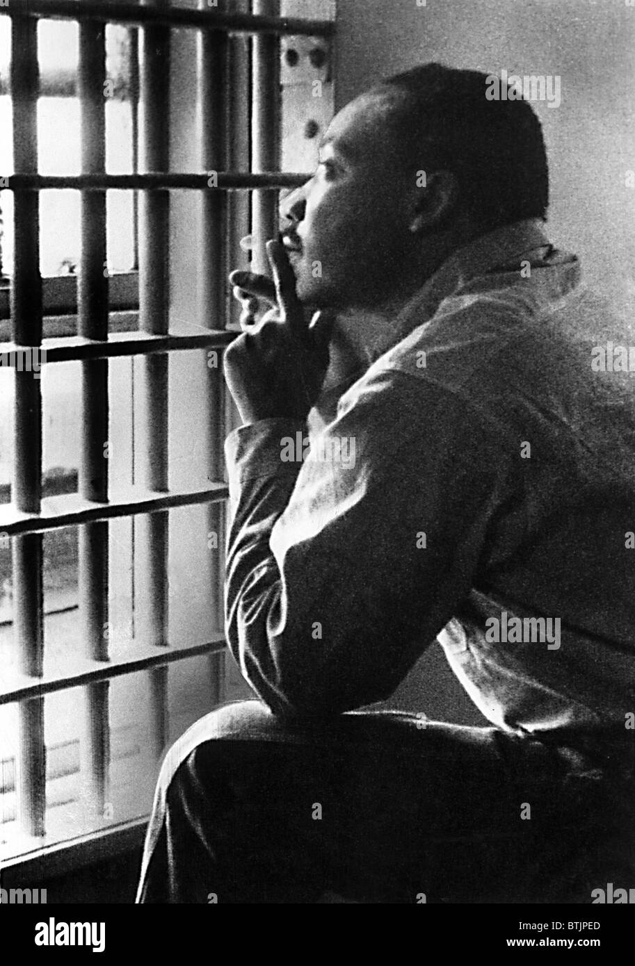 MARTIN LUTHER KING, JR, sitting in the Jefferson County Jail, in Birmingham, Alabama, 11/3/67. Everett/CSU Archives. Stock Photo