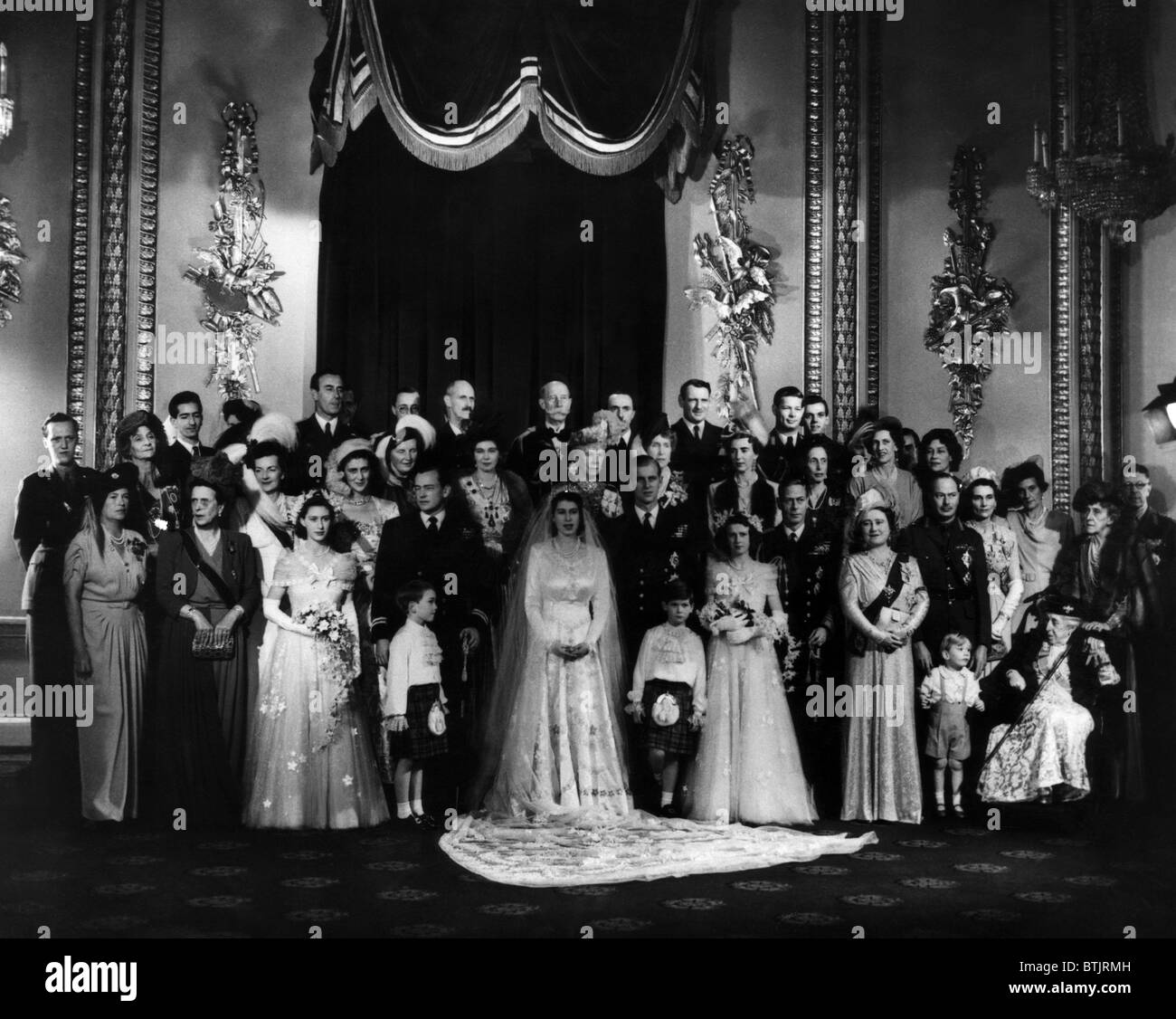 The marriage of Princess Elizabeth (the future Queen Elizabeth II), to Prince Philip: Front row: Princess Margaret (third from l Stock Photo