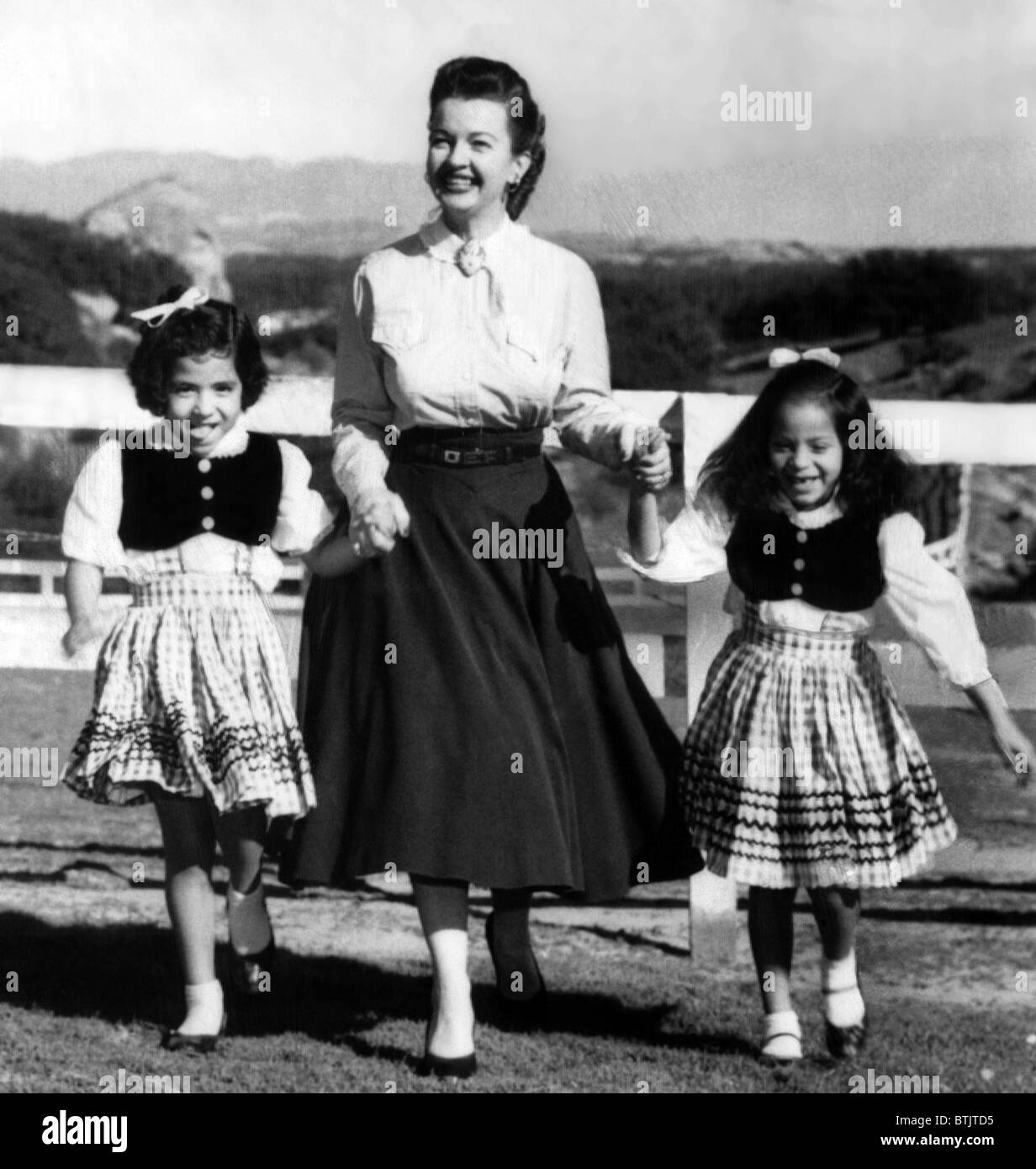 Dale Evans (center), with her two adopted daughters, Deborah Lee (left), Merry Doe (right),  circa 1959. CSU Archives/Courtesy E Stock Photo