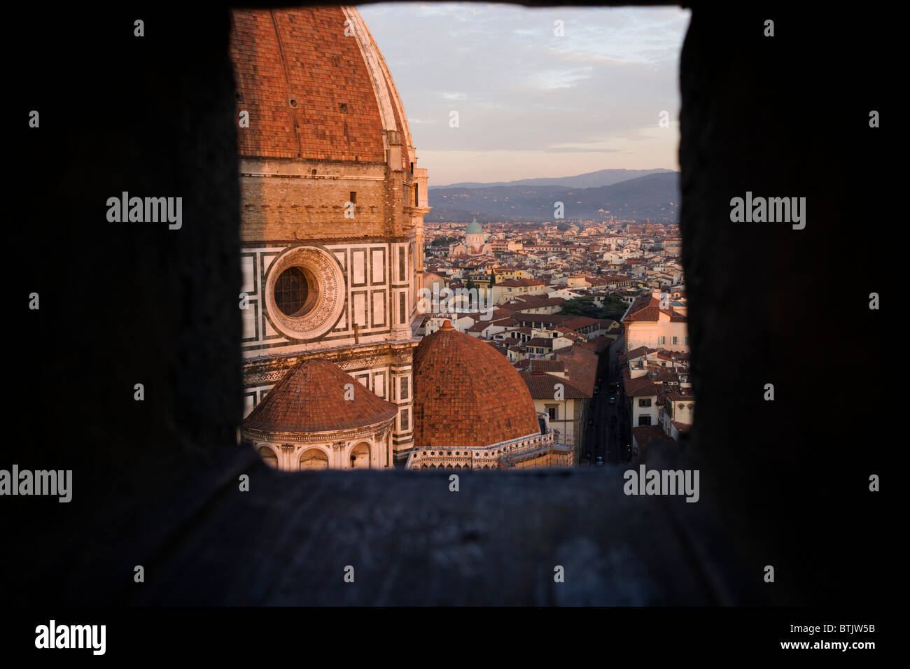 Brunelleschi's Dome seen from a portal within Giotto's Bell Tower (the campanile), Florence.. Stock Photo
