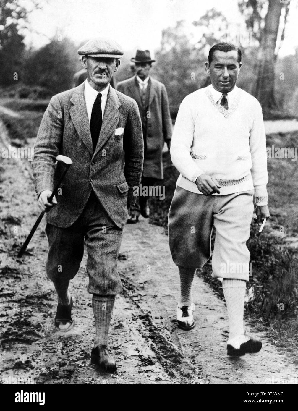 Golfers Abe Mitchell Walter Hagen at the golf course at Weybridge, England during a match.  June 25, 1926. Courtesy: CSU Archive Stock Photo