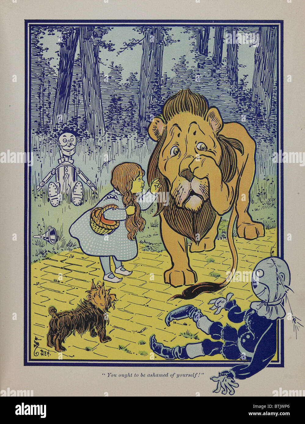 'Wonderful Wizard of Oz' main characters, created by Frank Lyman Baum in 1900.  Dorothy speaks to the Cowardly Lion. Stock Photo