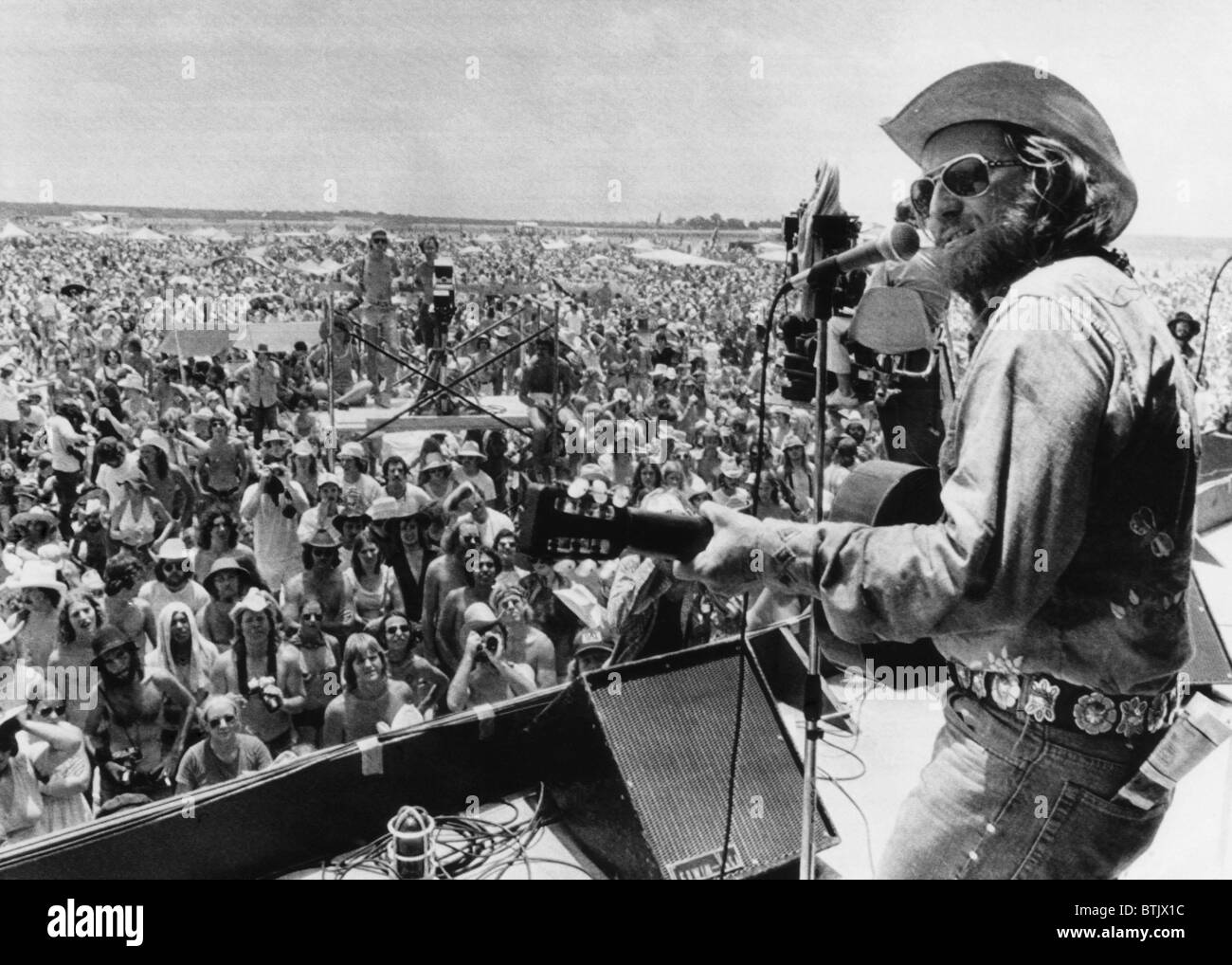 Country rock singer Willie Nelson opening the 'July 4th Picnic' music festival, 1974. Stock Photo