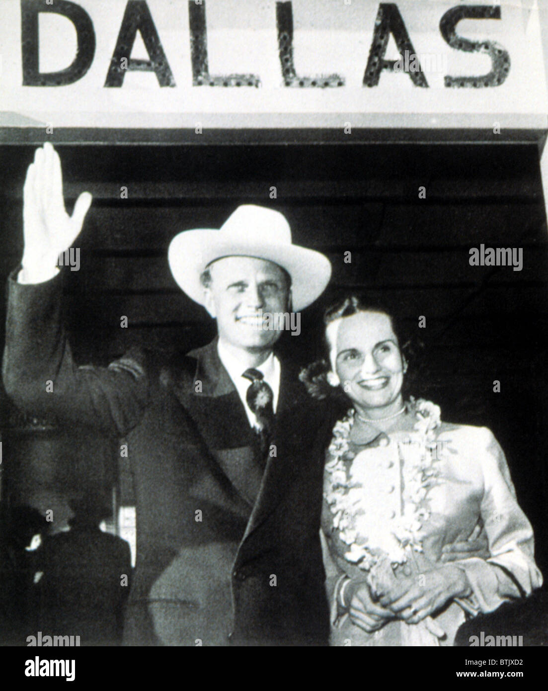 Billy Graham greeted by wife, Ruth, on return from Korea, 1/9/53 at Love Field, Dallas Stock Photo