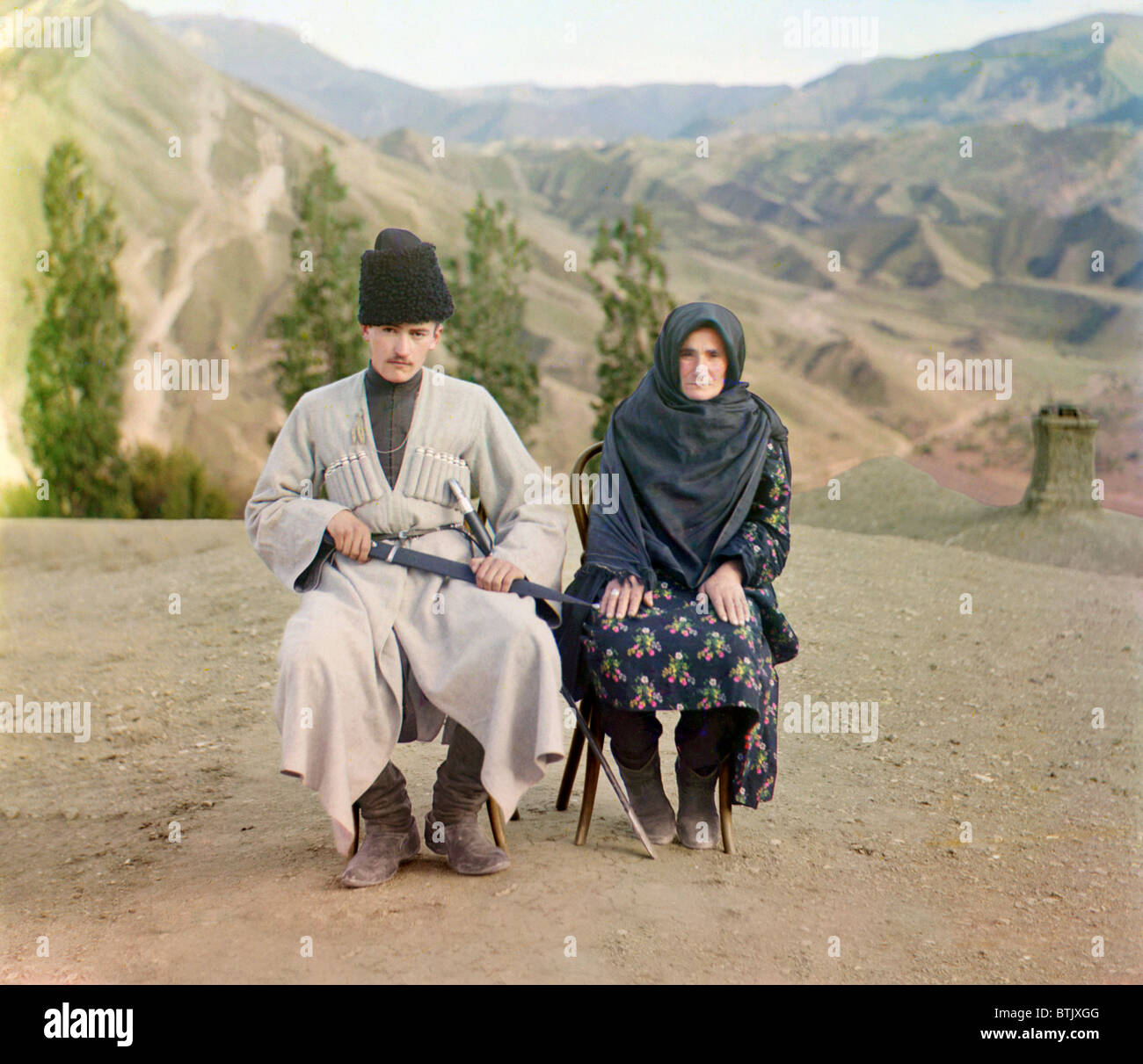 Man and woman of Dagestan, title: 'Dagestani types', original translation: 'Tipy Dagestani', photograph by Sergei Mikhailovich Prokudin-Gorskii, 1905-1915. Stock Photo