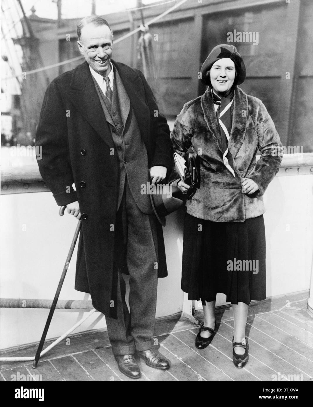 Sinclair Lewis, 1885-1951, the first American awarded the Nobel Prize for Literature, sails with his wife from New York to Stockholm in 1930. Stock Photo