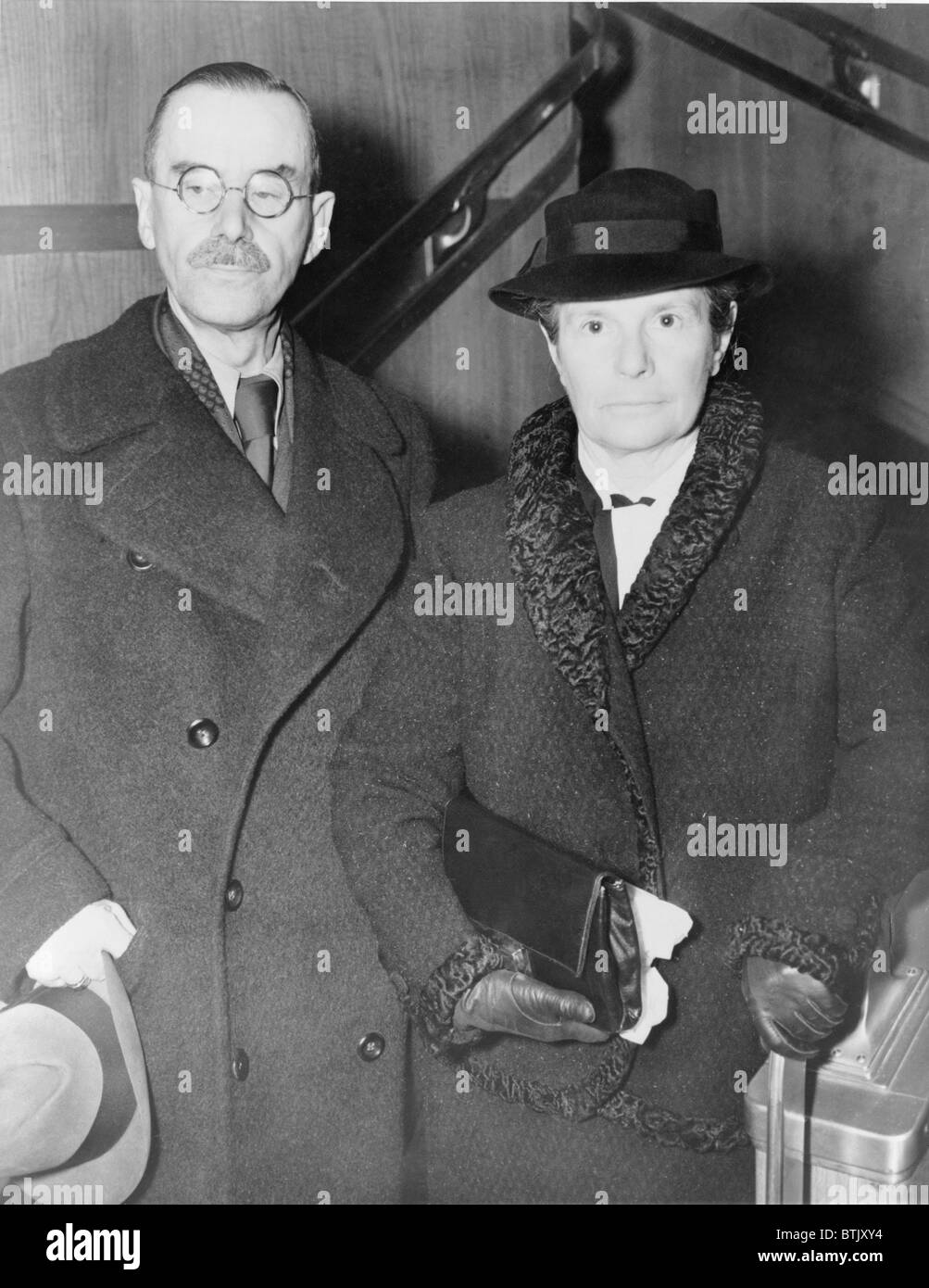 Thomas Mann (1875-1955) and wife, Katia, in 1938, as they arrived to spend the WWII years in exile in Princeton, NJ. Thomas Mann, a German, won the 1929 Nobel Prize for Literature. Stock Photo