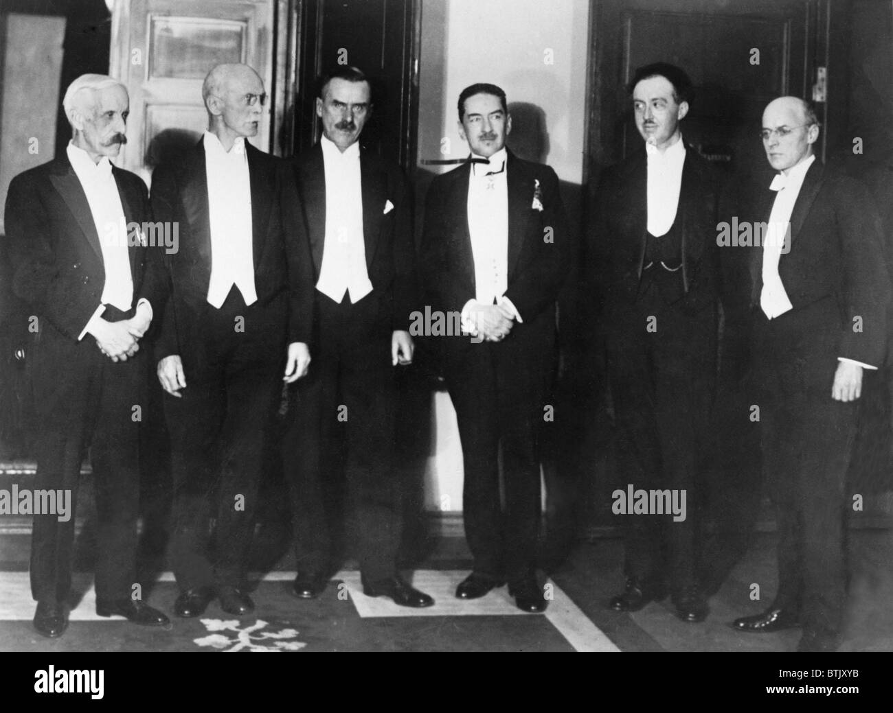 Gustav V, King of Sweden, (1858-1950) with 1929 Nobel Prize winners. The six winners of the Nobel Prizes for 1929 after being presented with their awards by King Gustav of Sweden in Stockholm. Left to right: Frederick Gowland Hopkins, Arthur Harden, Thomas Mann, Hans Von Euler, Prince Louis de Broglie of Paris, Owen W. Richardson. Stock Photo