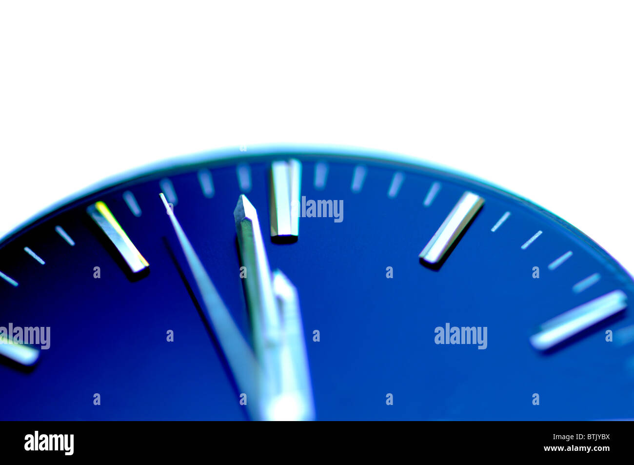 Watch face at one minute to midnight Stock Photo