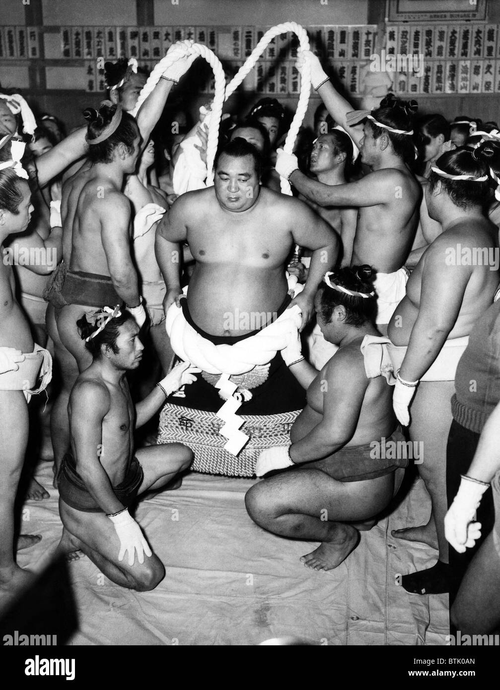 Sumo Wrestlers in Japan. ca 1950s. Courtesy: CSU Archives/Everett Collection. Stock Photo