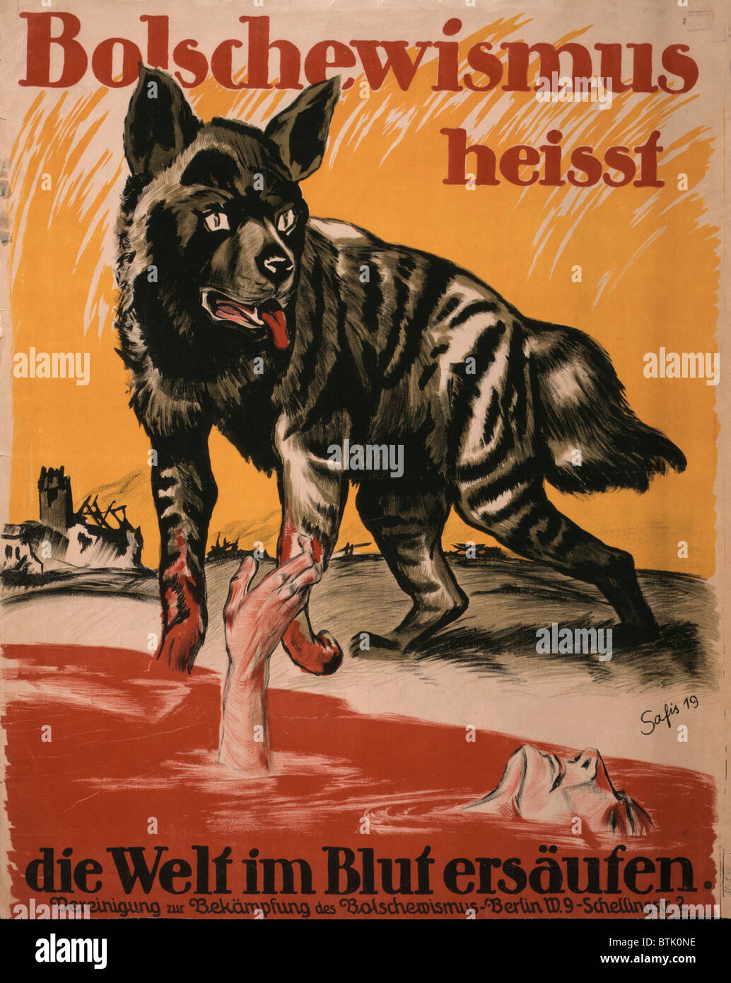 World War I, Bolshevism, Poster shows a wolf standing near a pool of blood with a man drowning and destroyed buildings. Text: 'Bolshevism means the world will drown in blood. Association to Fight Against Bolshevism.', German text reads: 'Bolschewismus heisst die Welt im Blut ersäufen', poster by Joh Safis, 1919. Stock Photo