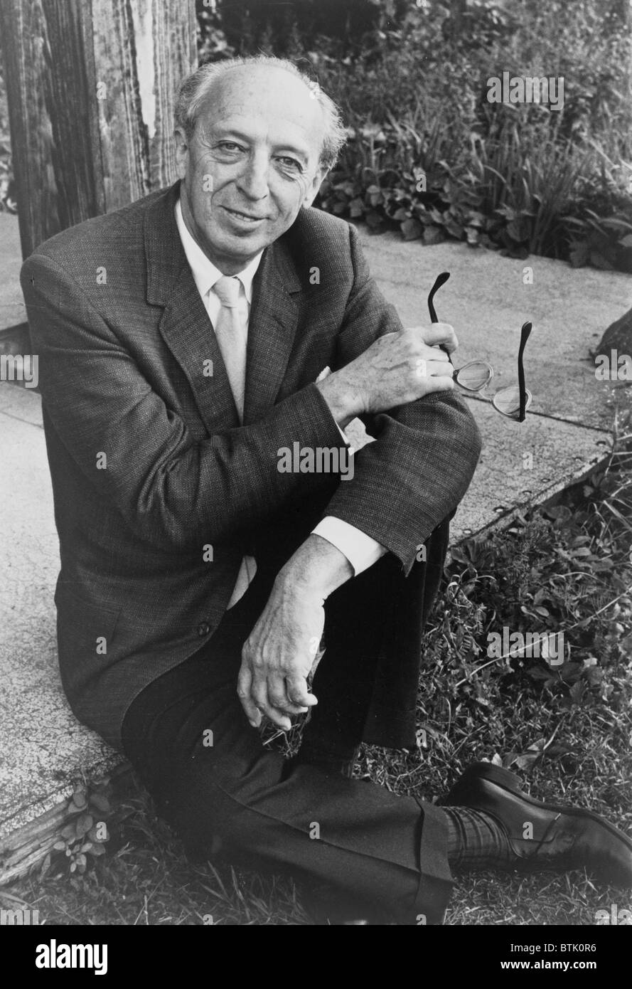 Aaron Copland (1900-1990), American composer, seated outdoors at the MacDowell Colony, a prestigous artists' colony in New Hampshire, 1965. Stock Photo