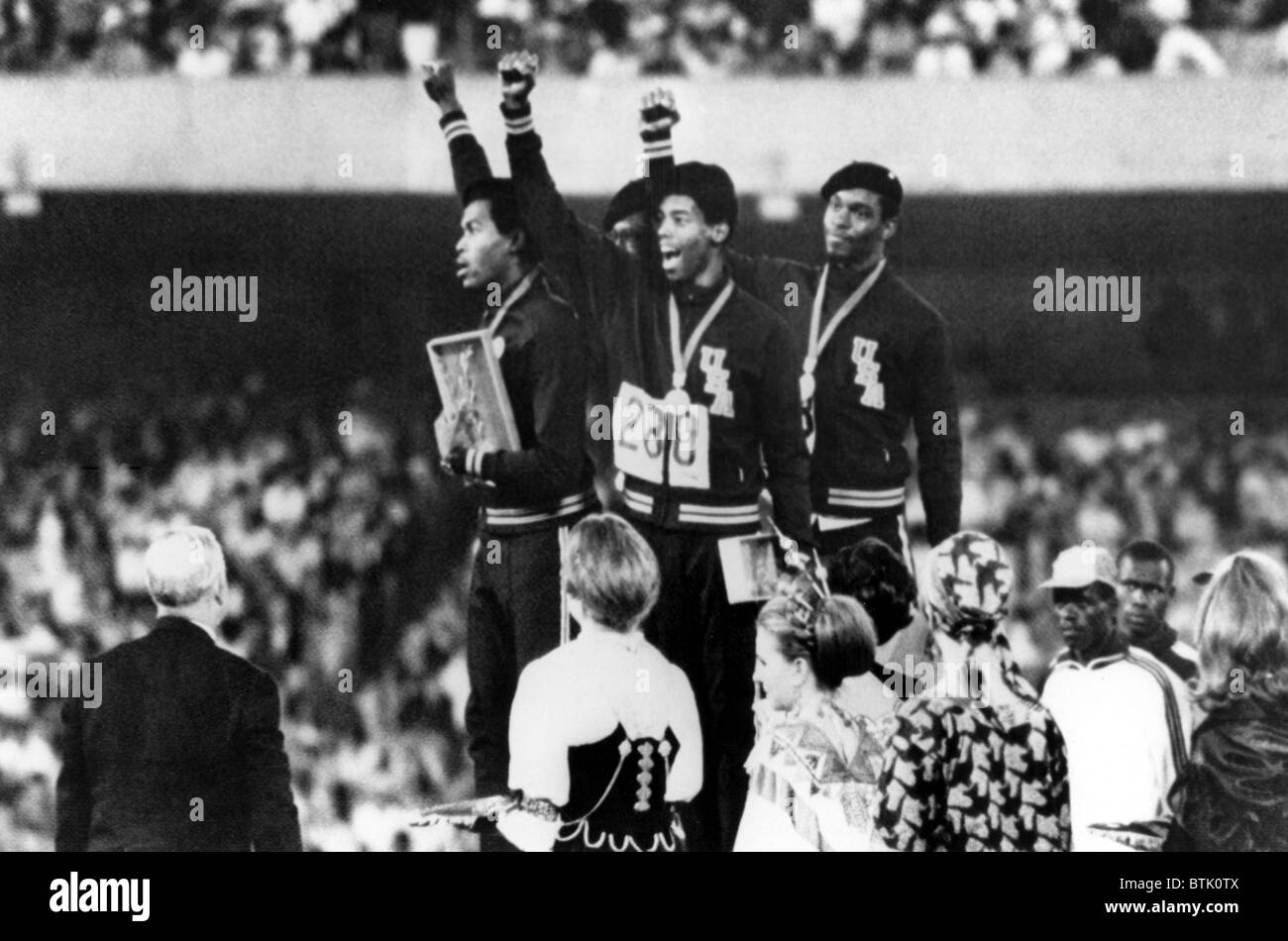 1968 Olympics, 4x400 Men's Relay Team gives 'Black Power' salute upon receiving Gold Medals. (L-R) Lee Evans, Ronald Freeman, La Stock Photo