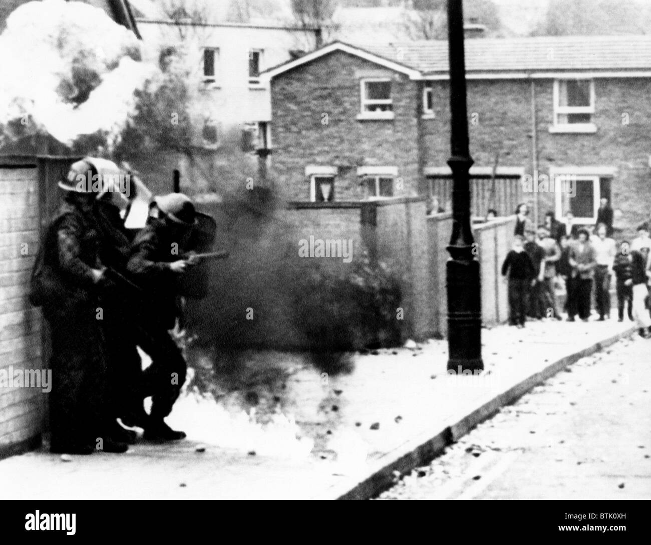 British troops stopped by a gasoline bomb thrown by rioters in Londonderry, Northern Ireland, 1971 Stock Photo