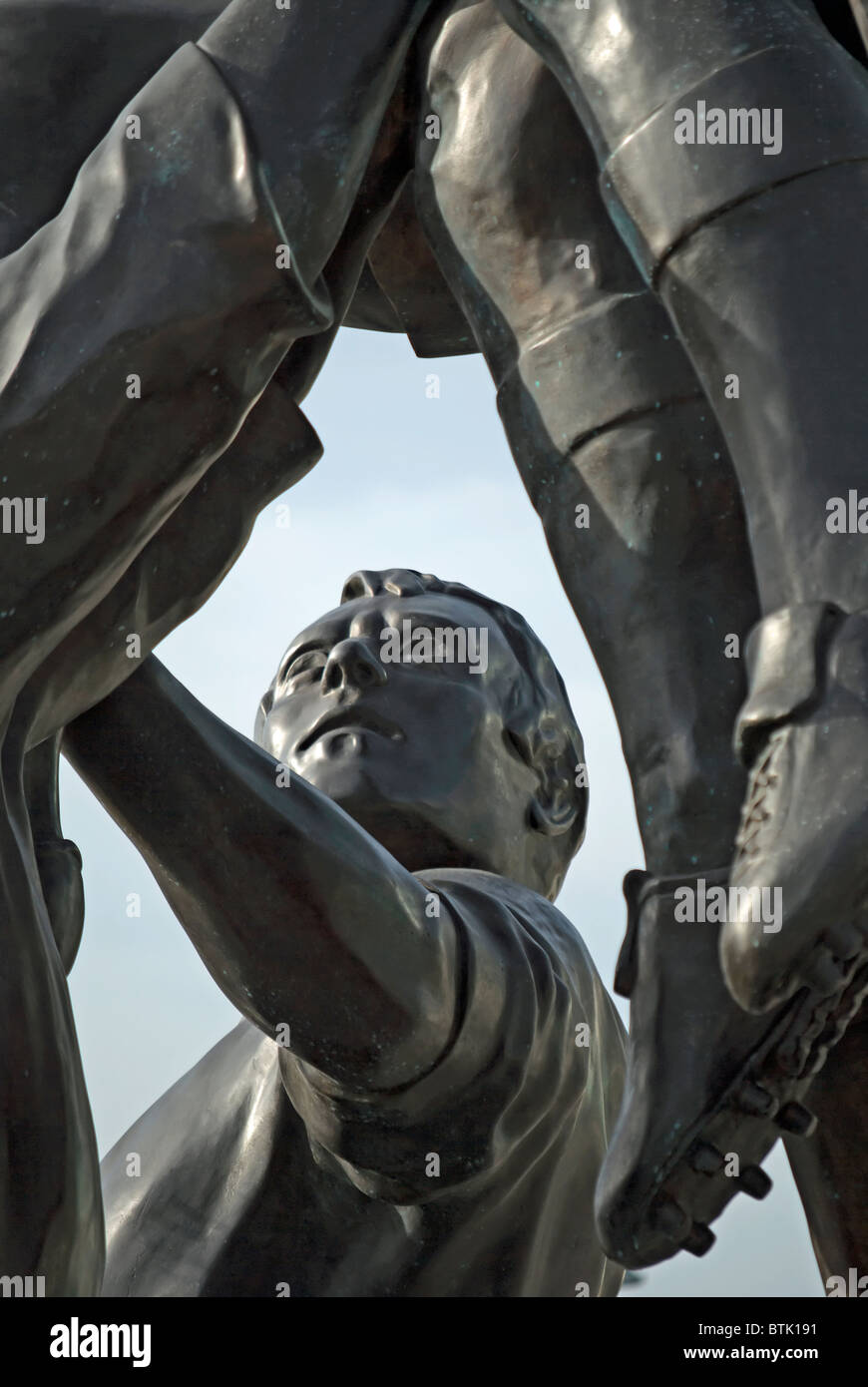 detail of gerald laing's bronze sculpture depicting a rugby lineout, outside twickenham stadium, twickenham, middlesex, england Stock Photo