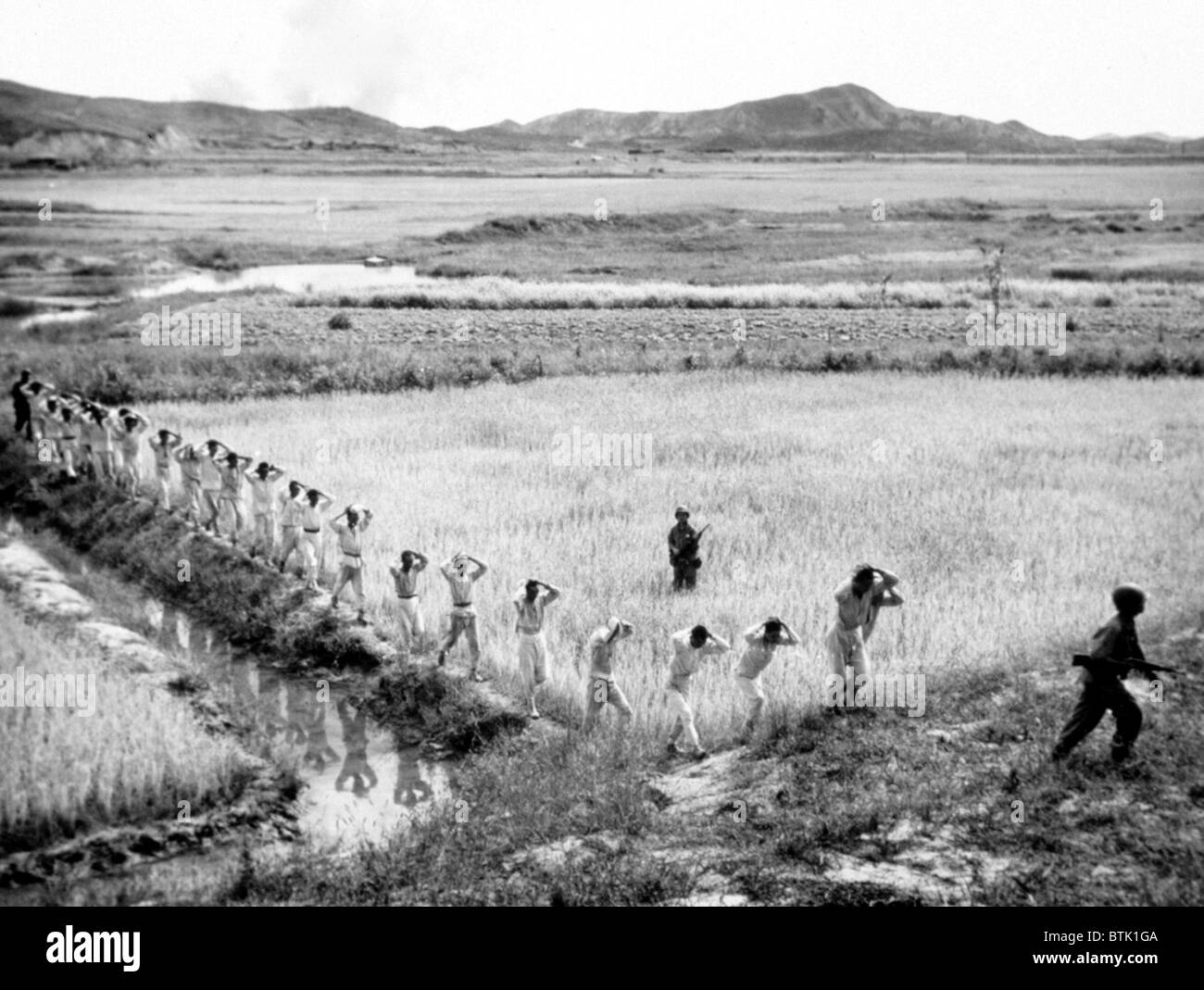Korean War: U.S. Marines taking North Koreaan soldiers prisoner, Korea, 1951. Stock Photo