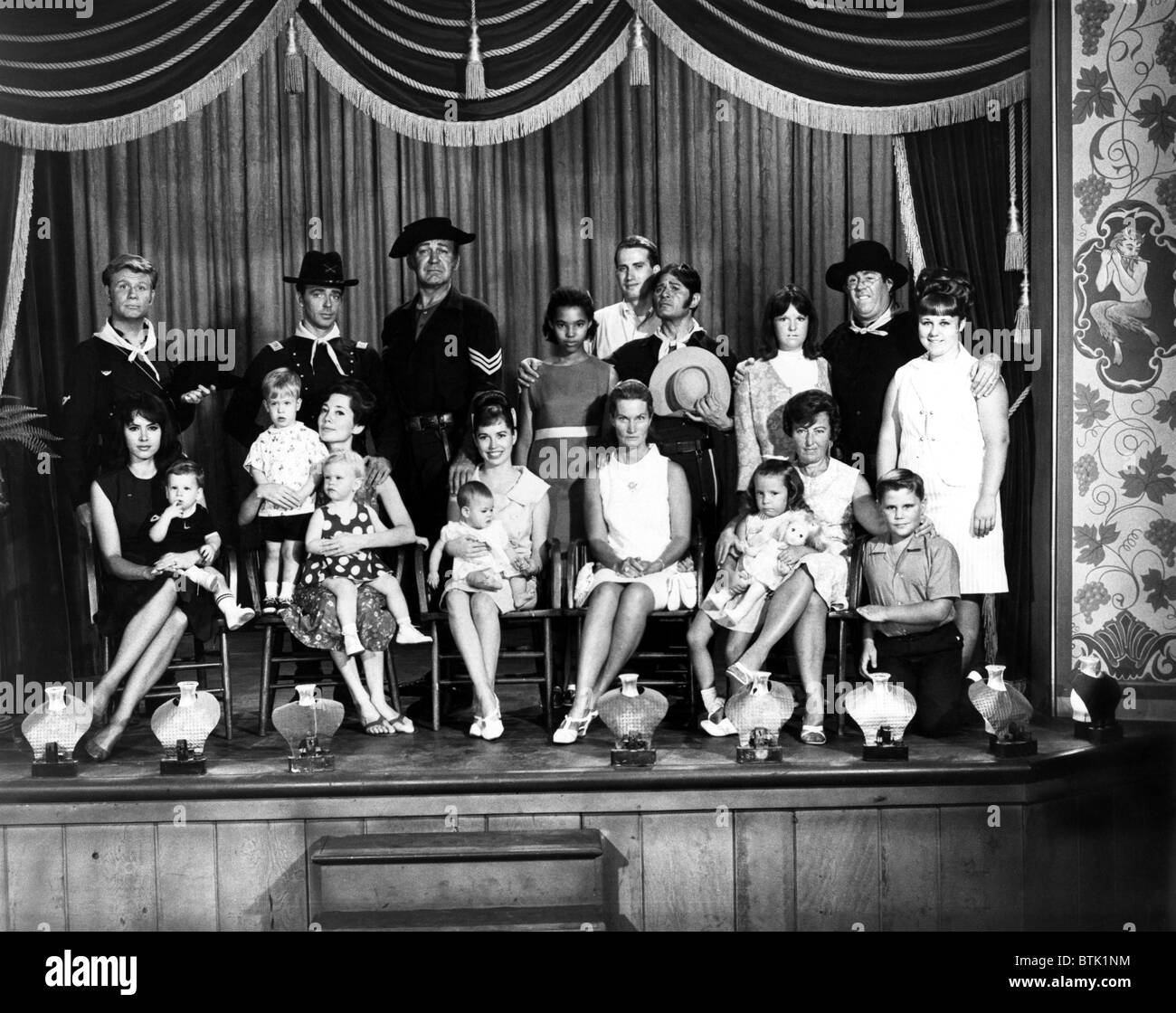 F TROOP, cast and their families on the set. James Hampton, Ken Berry, Forrest Tucker, Larry