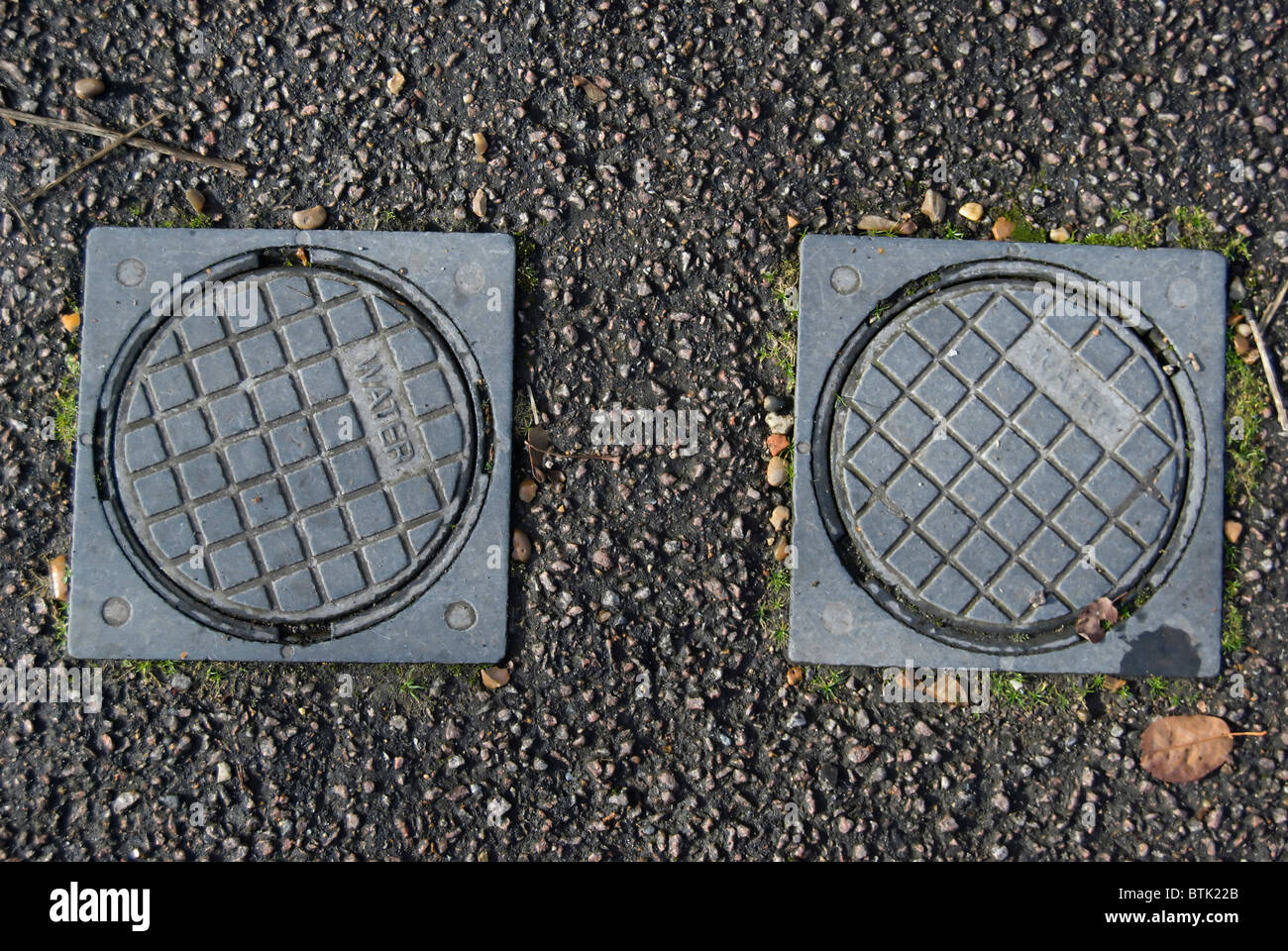 pair of thames water street main covers, in twickenham, middlesex, england  Stock Photo - Alamy