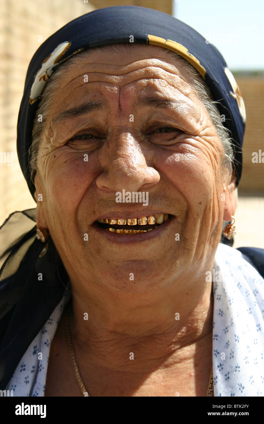 Traditional lady with gold teeth in Uzbekistan Stock Photo Alamy