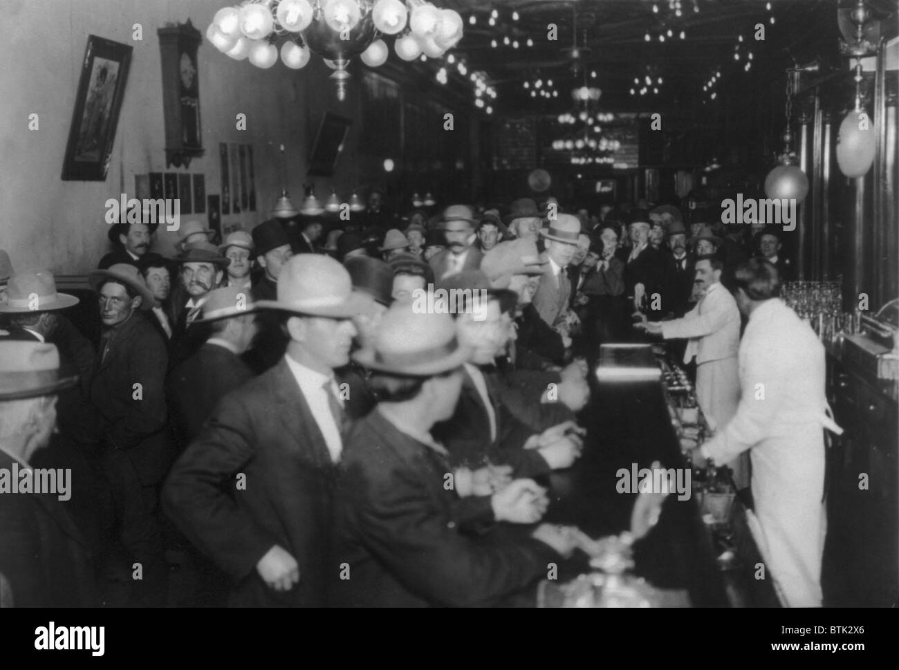 Nevada, open gambling in Reno, looking down crowded bar, photograph by