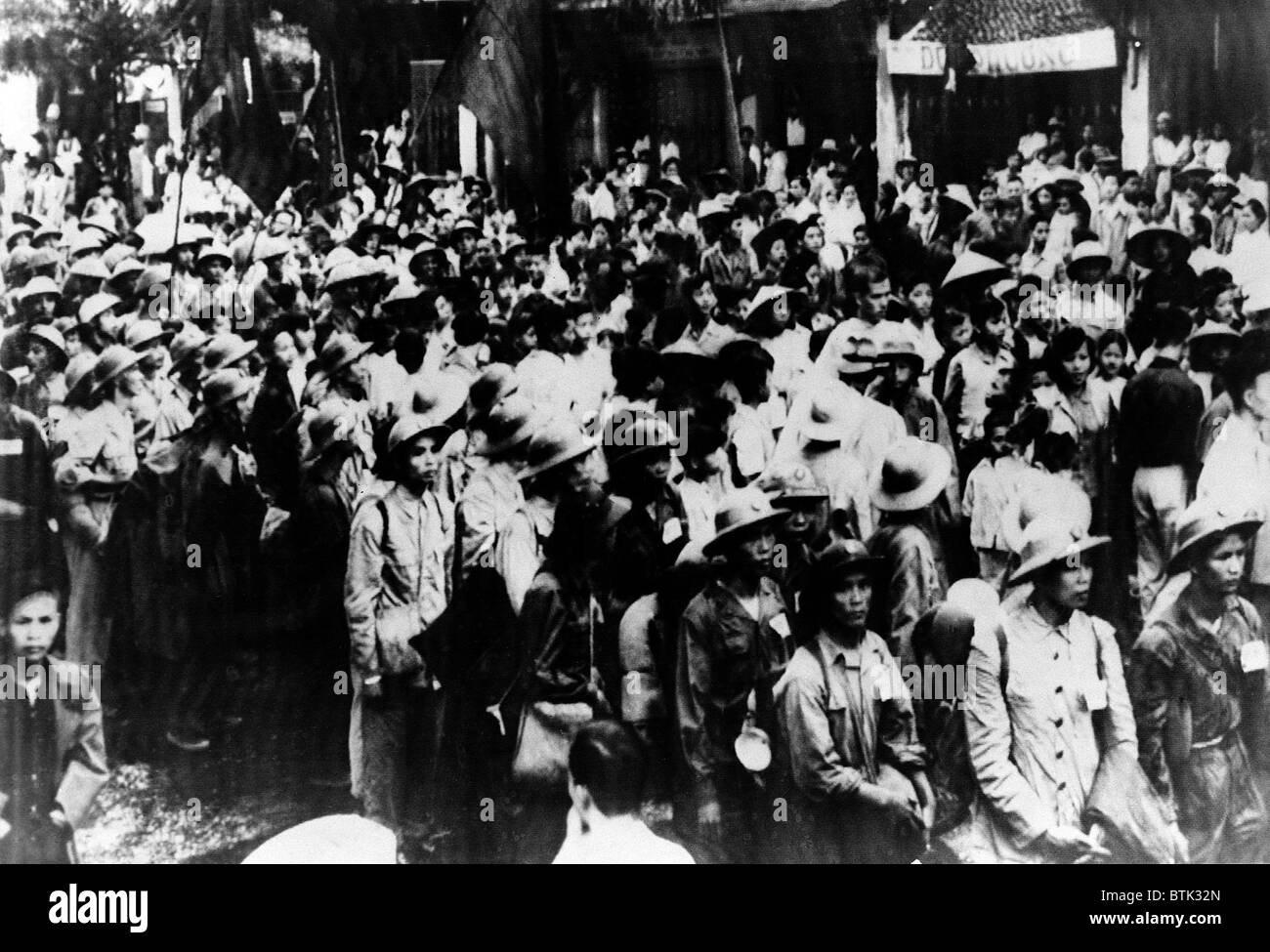 Victorious Viet Minh troops march into Hanoi in 1954. The communist Viet Minh, the League for the Independence of Vietnam, founded by Ho Chi Minh and fought against French colonialism from 1946-1954. Stock Photo