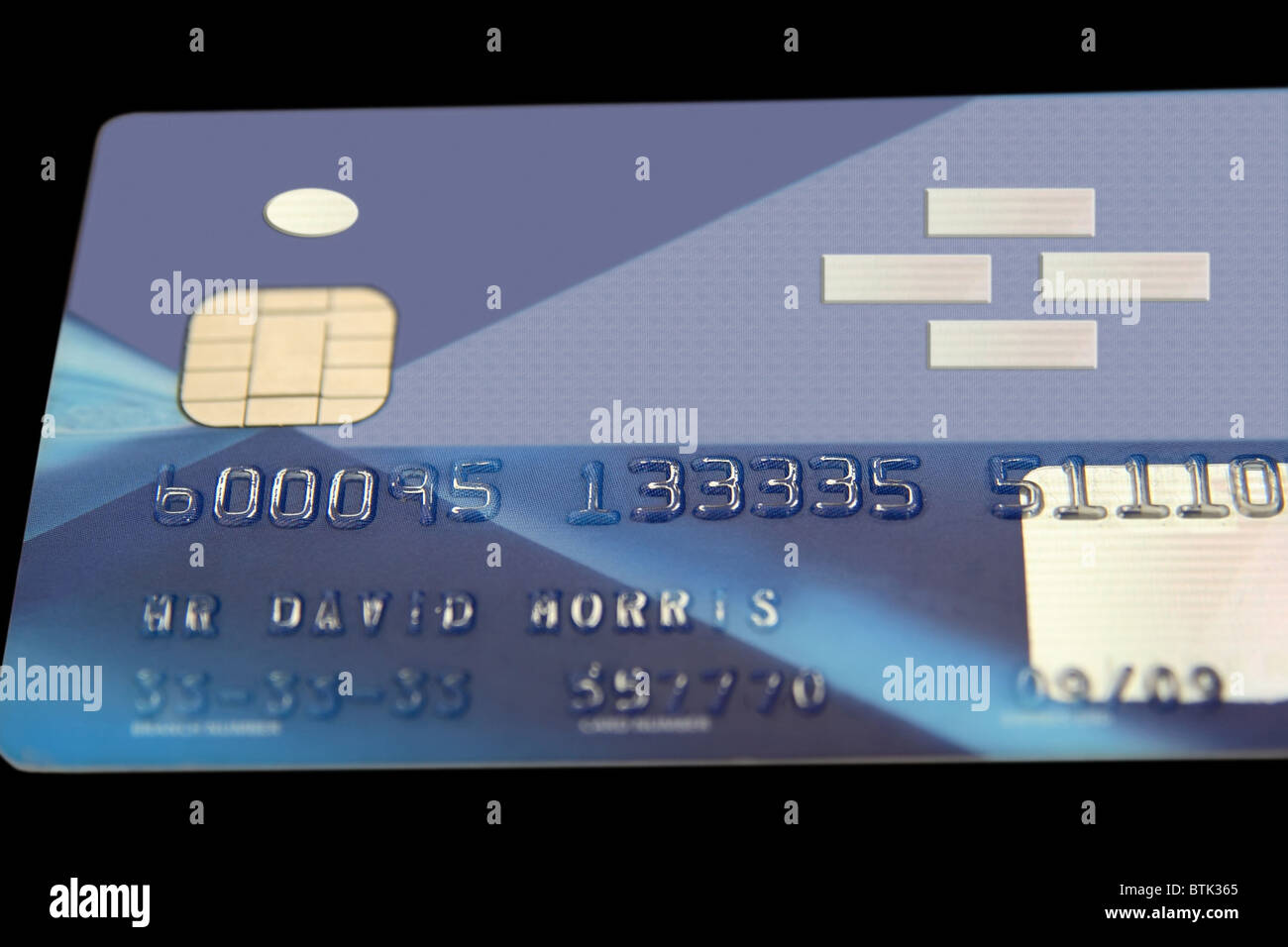 fake bank card ( totaly remade ) on a black background with clipping path Stock Photo