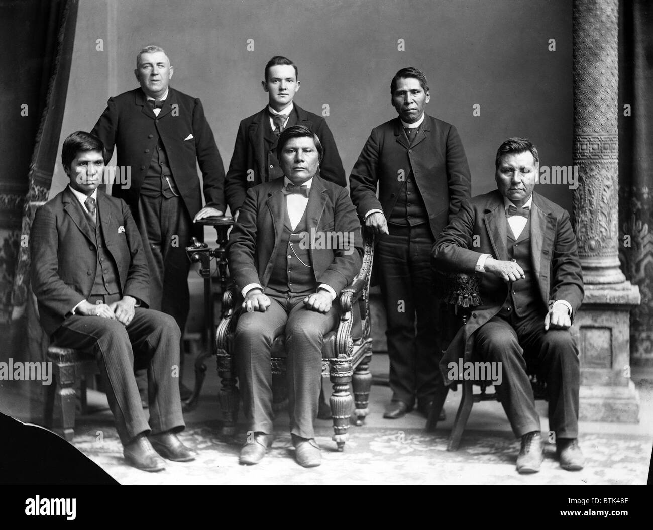 Nez Perce delegates with Benjamin Beveridge (left, standing), owner of Washington House, Washington, DC. ca. 1880 Stock Photo