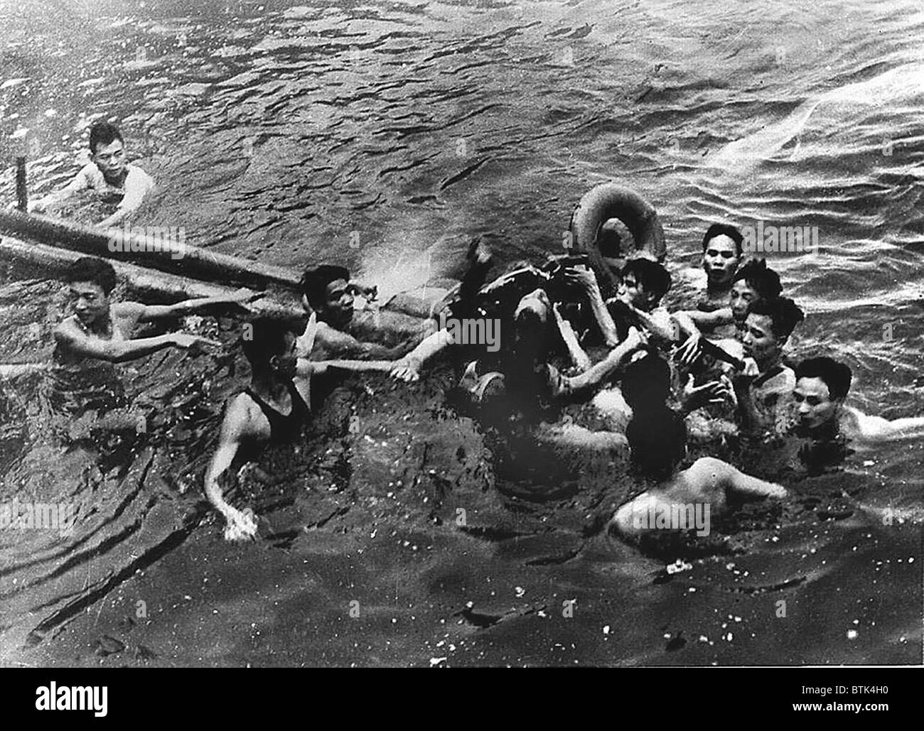 Lieutenant Commander John S. McCain, (center) being captured by Vietnamese civilians in Truc Bach Lake near Hanoi, Vietnam. October 26, 1967 Stock Photo