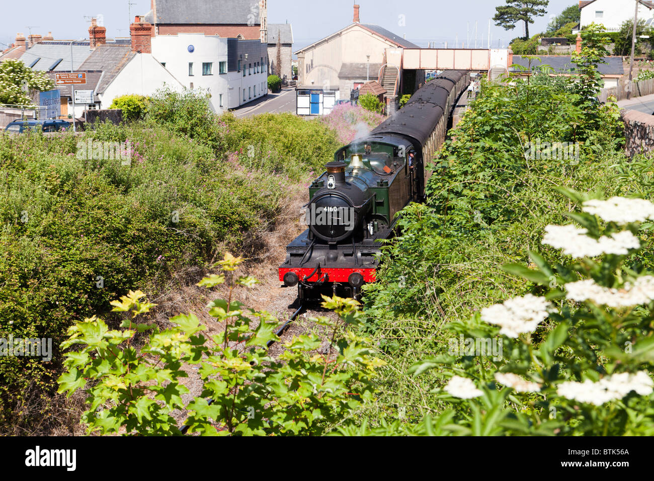 ‘5101’ Class 2-6-2T No 4160 steam engine leaving Watchet Station pulling a train on the West Somerset Railway, Watchet, Somerset Stock Photo