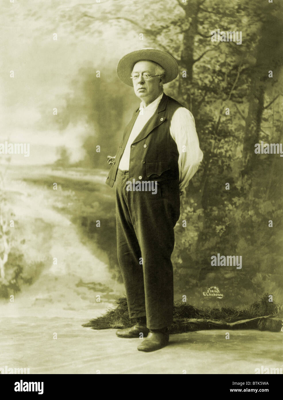 Denman Thompson (1833-1911) , American playwright and actor who career was based on one hugely successful role, that of Josh from his play THE OLD HOMESTEAD, 1886. He played Josh, a rural farmer, in baggy pants, an ill-fitting vest, thick glasses, and a large straw hat, who travels to New York to rescue his derelict son. 1900 photo. Stock Photo