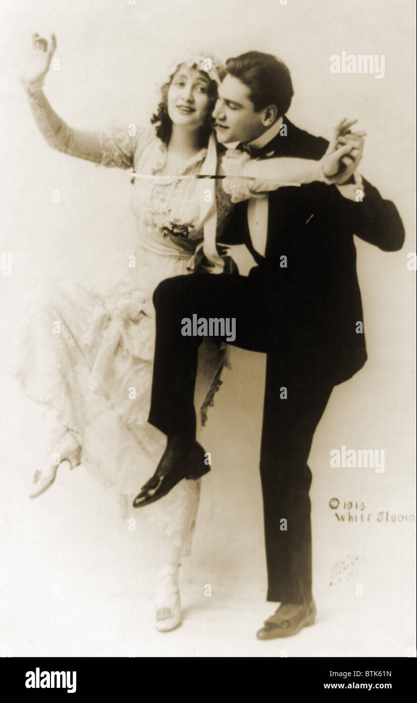 Gaby Deslys (1881-1920), French dancer and actress, dancing with tuxedoed man in 1913. King Manuel II of Portugal reportedly gave her a very valuable pearl necklace 1909, one year before his overthrow. Stock Photo