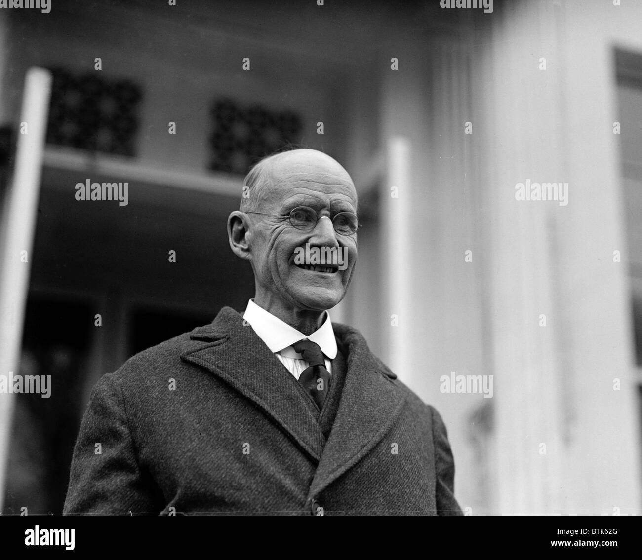 Eugene Debs leaving the White House after meeting Republican President Warren G. Harding, who commuted Debs' Espionage Act of 1917 sentence to time served. December 26, 1921 Stock Photo
