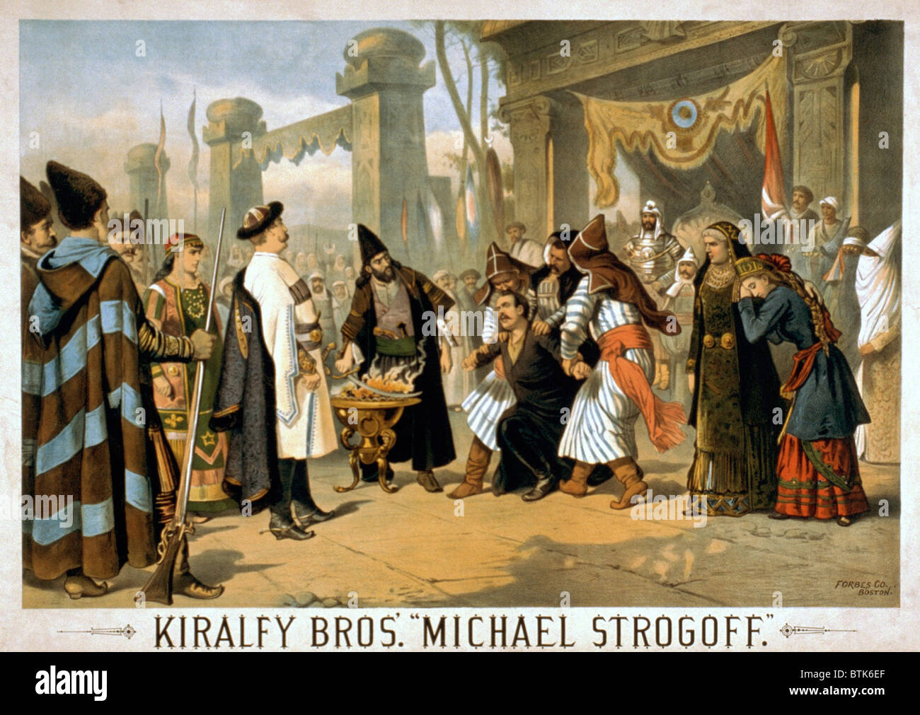 1882 Poster for MICHAEL STORGOFF; THE COURIER OF THE CZAR, shows the scene in which the Tatar king Feofar Khan prepares to blind Michael Strogoff with a hot iron. The Kiralfy brothers, Bolossy (1848-1932) and Imre (1849-1919), specialized in the production of extravagantly spectacular stage productions. Stock Photo