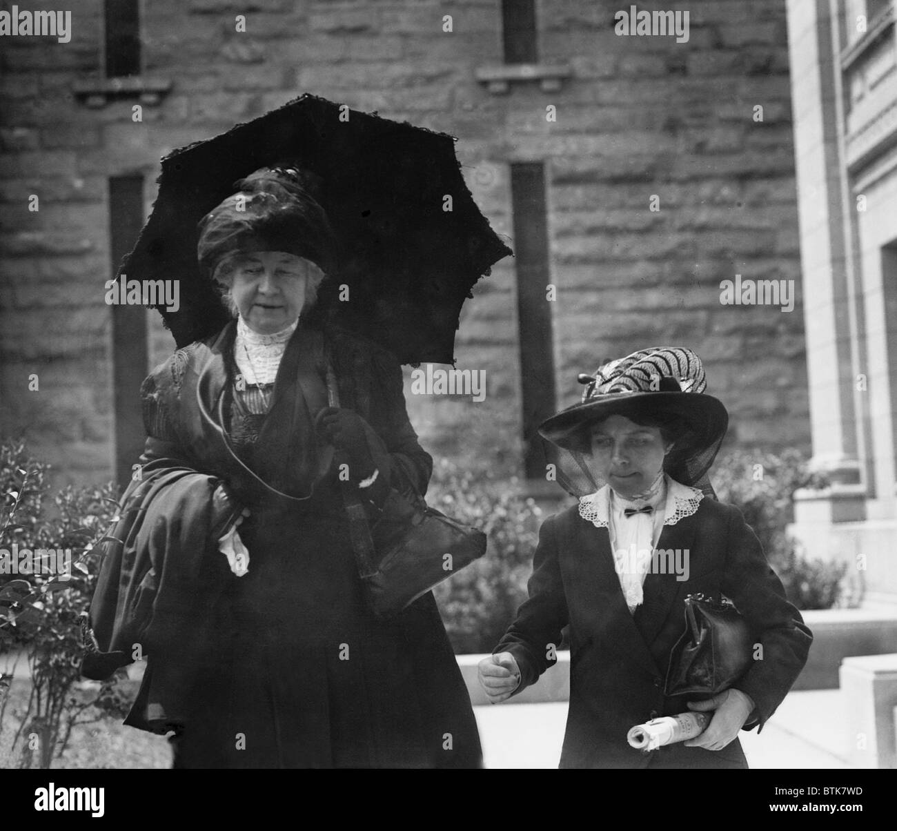 Mrs. William Thaw, on left, during the trial of her son, Harry, for the murder of architect Stanford White. She is accompanied by a women named Miss Carnegie. Ca. 1907-09. Stock Photo