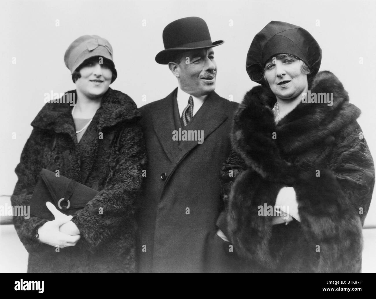 Sir Joseph Duveen (1869-1939), with his wife and daughter, Dorothy on board an ocean liner in New York. Art dealer Duveen is supposed to have said, Europe has a great deal of art, and America has a great deal of money. Ca. 1925. Stock Photo