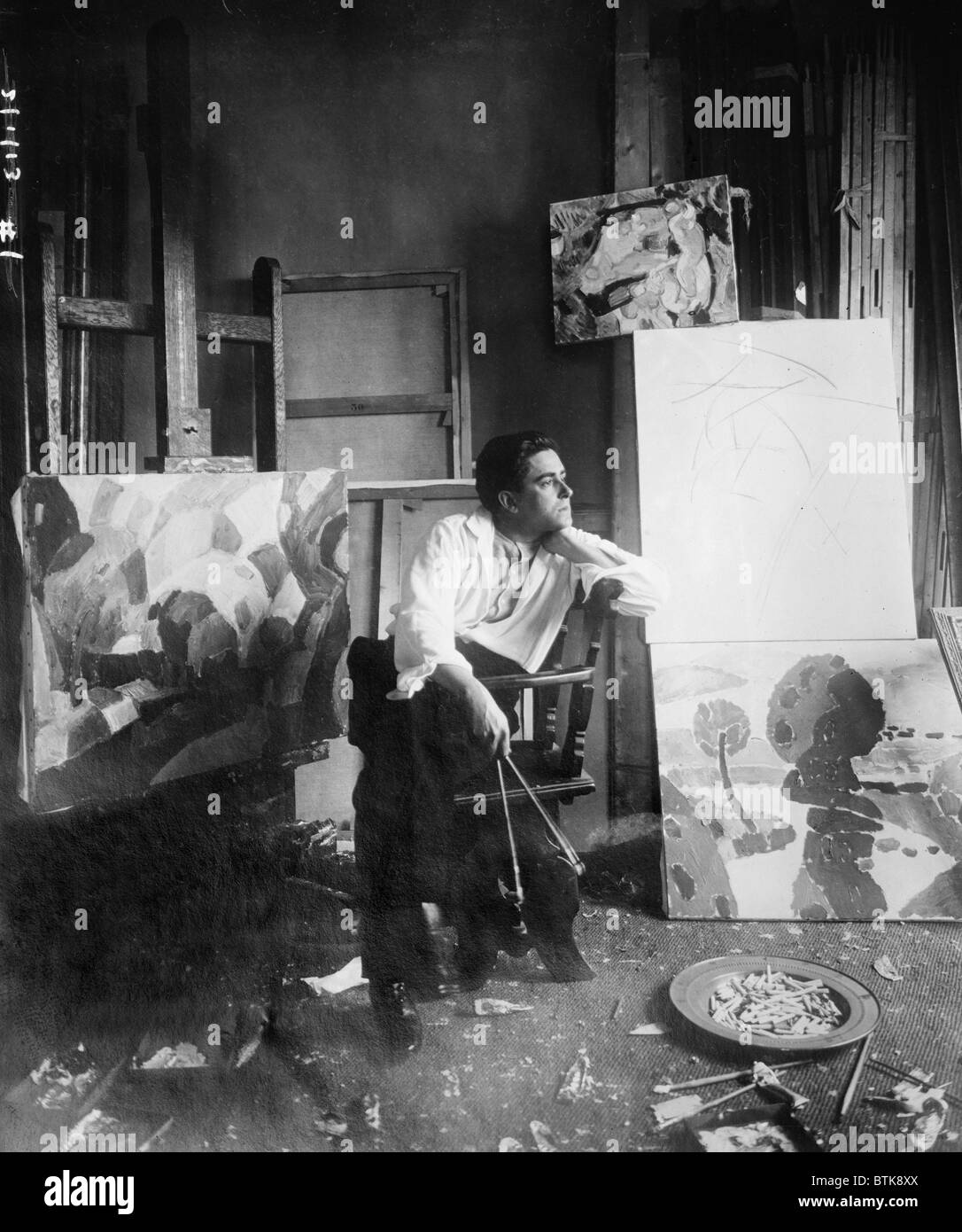 Francis Picabia (1879-1953), French painter associated with the Cubist and Surrealist styles in his studio in New York City , ca. 1915. Stock Photo