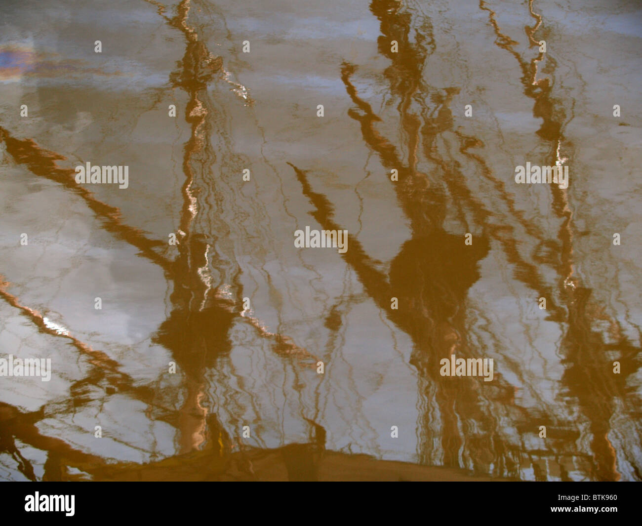 Reflection in the water of the rigging of an old three masted ship, Cornwall, UK Stock Photo