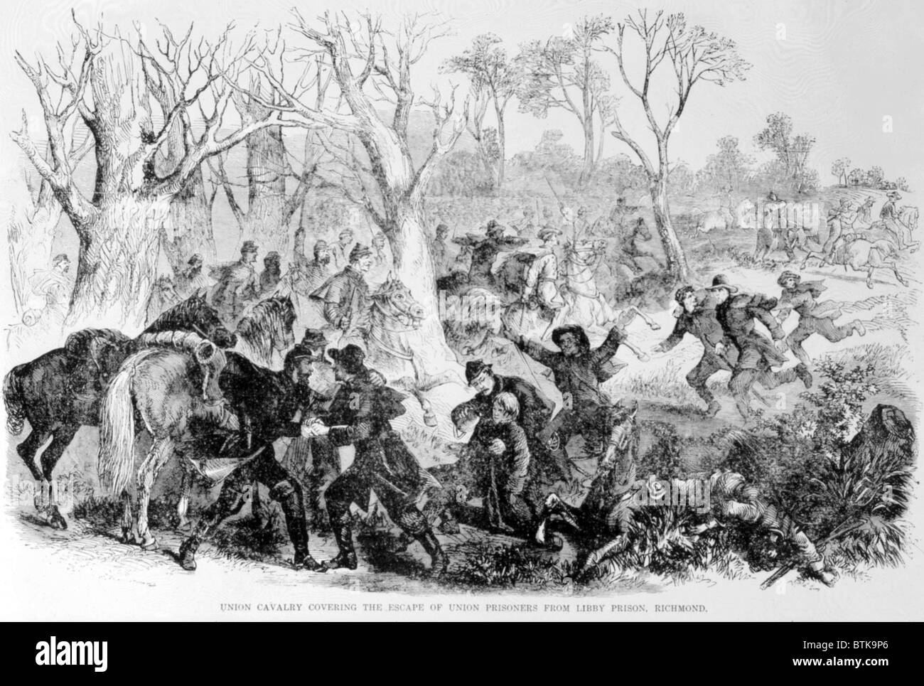 Union cavalry covering the escape of prisoners from Libby Prison in Richmond, Virginia Stock Photo