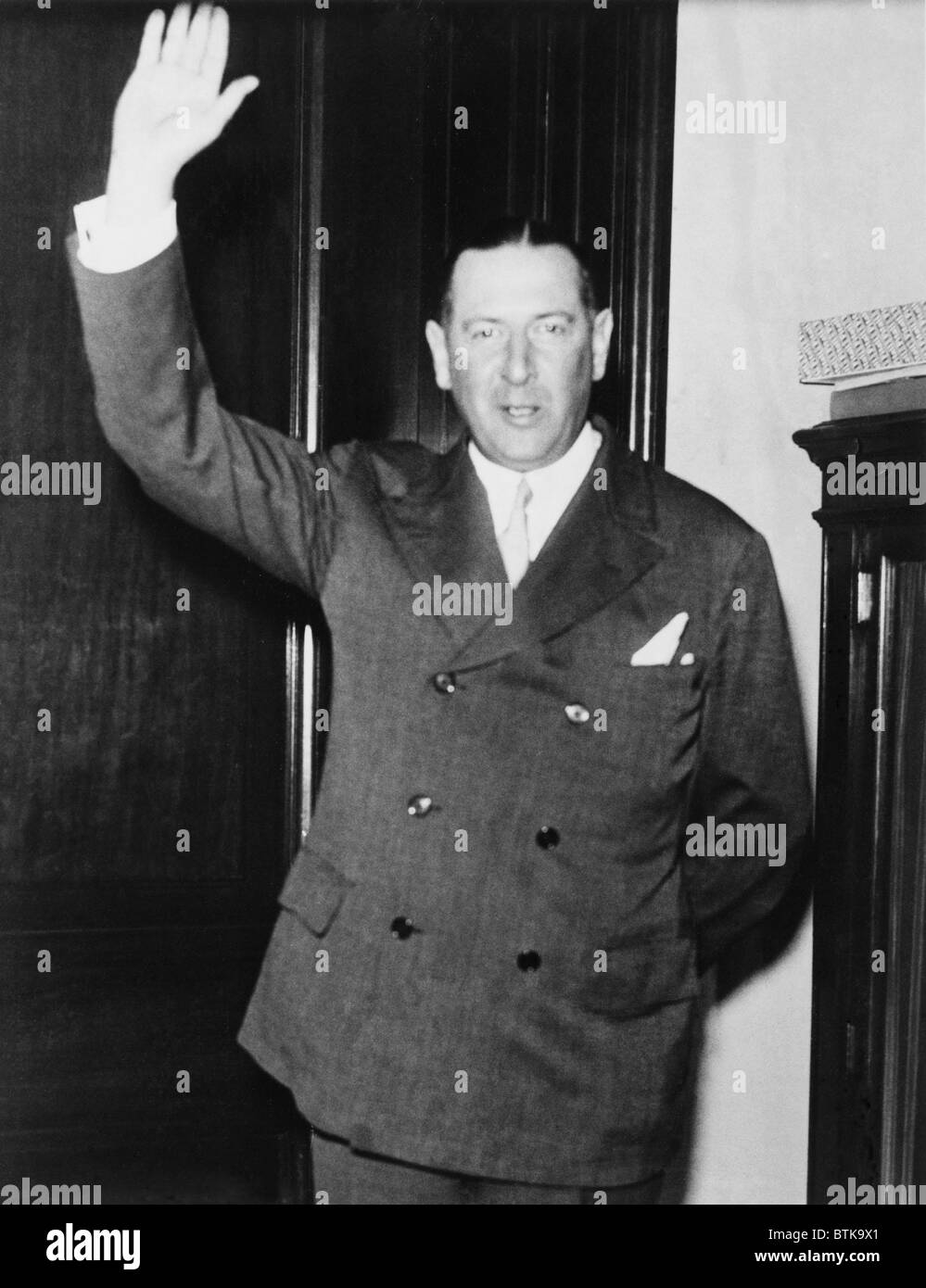 Richard Whitney (1888-1974), president of the New York Stock Exchange from 1930-35, takes an oath before testifying before the Senate Committee on Banking and Currency Investigation of Wall Street. Whitney would later serve a prison term for an unrelated embezzlement. 1932. Stock Photo