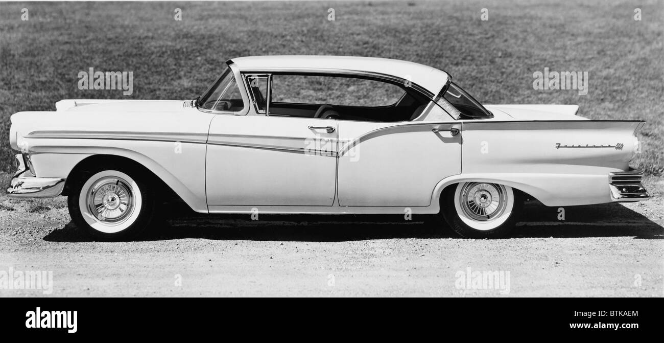1957 four-door Ford Victoria model of the Ford Fairlane 500. Late 1950 automotive style reached extremes, with emphatic sculpting, heavy chrome grills, and tailfins. Stock Photo