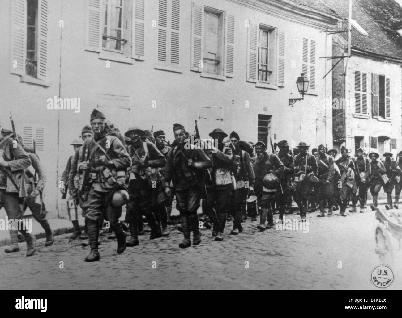 World War I, American troops of the 166th Infantry, 42nd Division, entering La Ferte-sous-Jouarre, France, U.S. Signal Corps photograph, 1918 Stock Photo