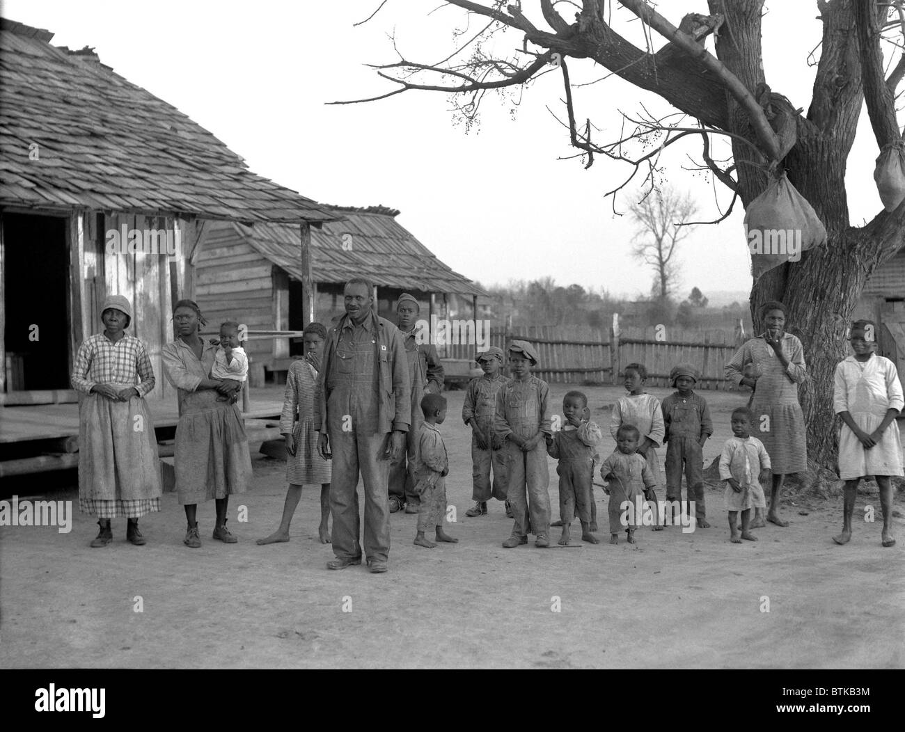 African American descendants of former slaves of the Pettway Plantation in Gees Bend, Alabama. 1937. Stock Photo