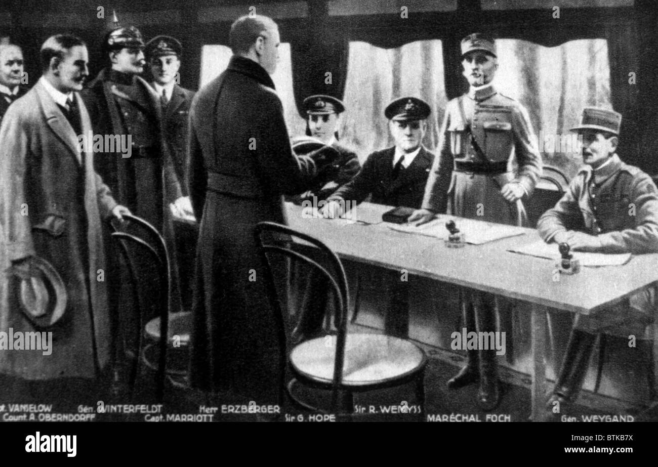 World War I, the signing of the Armistice in the railway car at Compiegne France, seated at table are Admiral George Hope, Sir Rosslyn Wemis, Marshal Ferninand Foch, General Maxime Weygand, November 11, 1918 Stock Photo