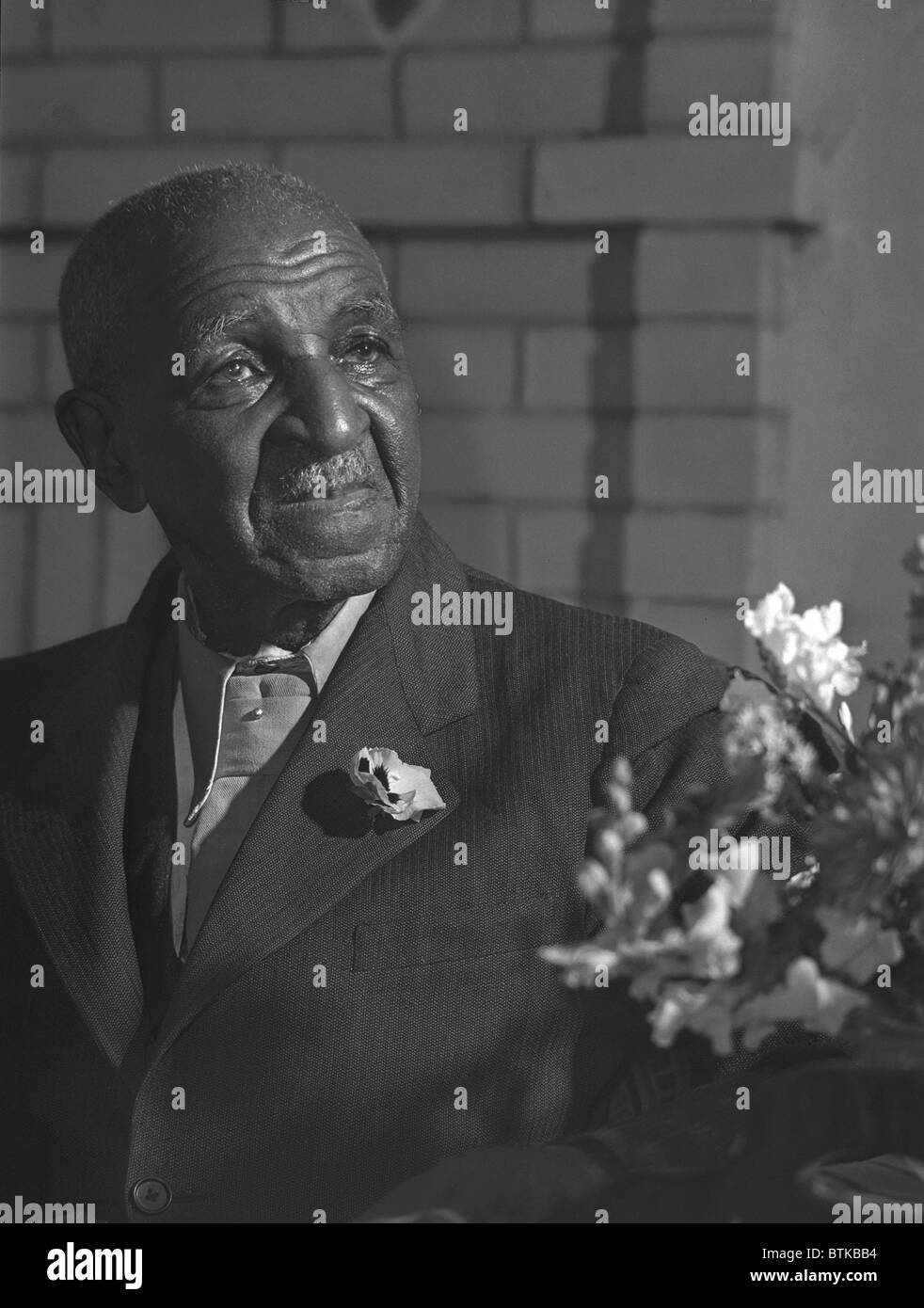 George Washington Carver (1864-1943) in 1943.  He was an agricultural scientist when most people made their living as farmers. Stock Photo