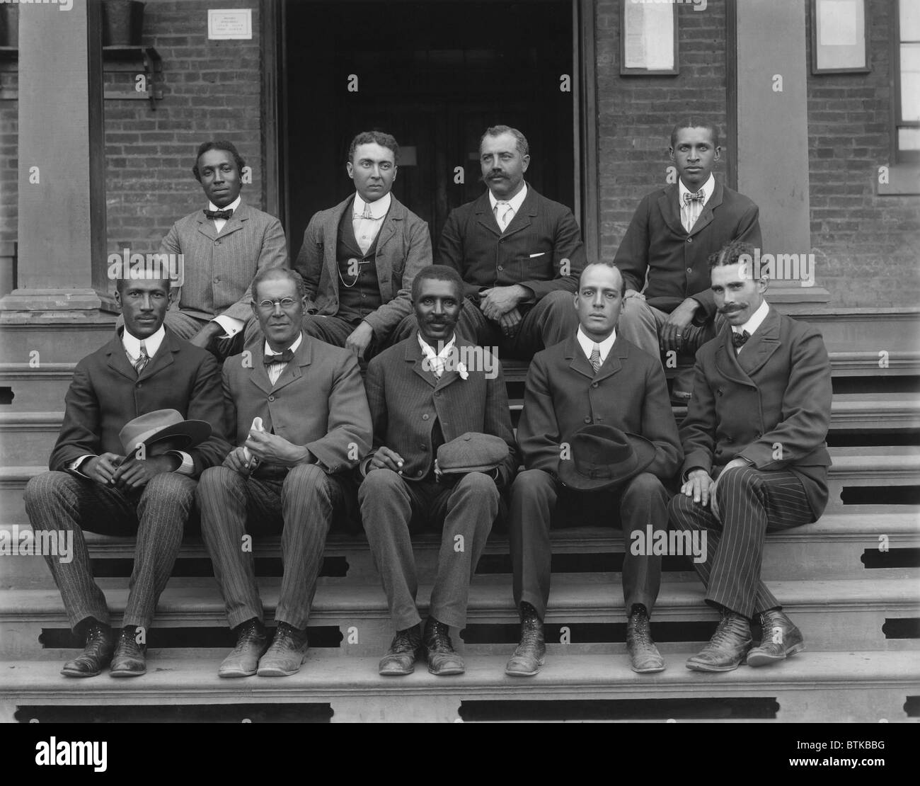 George Washington Carver (1864-1943) was named head of the Agriculture Department at the five year old Tuskegee Normal and Industrial Institute. 1902 portrait with his faculty and staff. Stock Photo