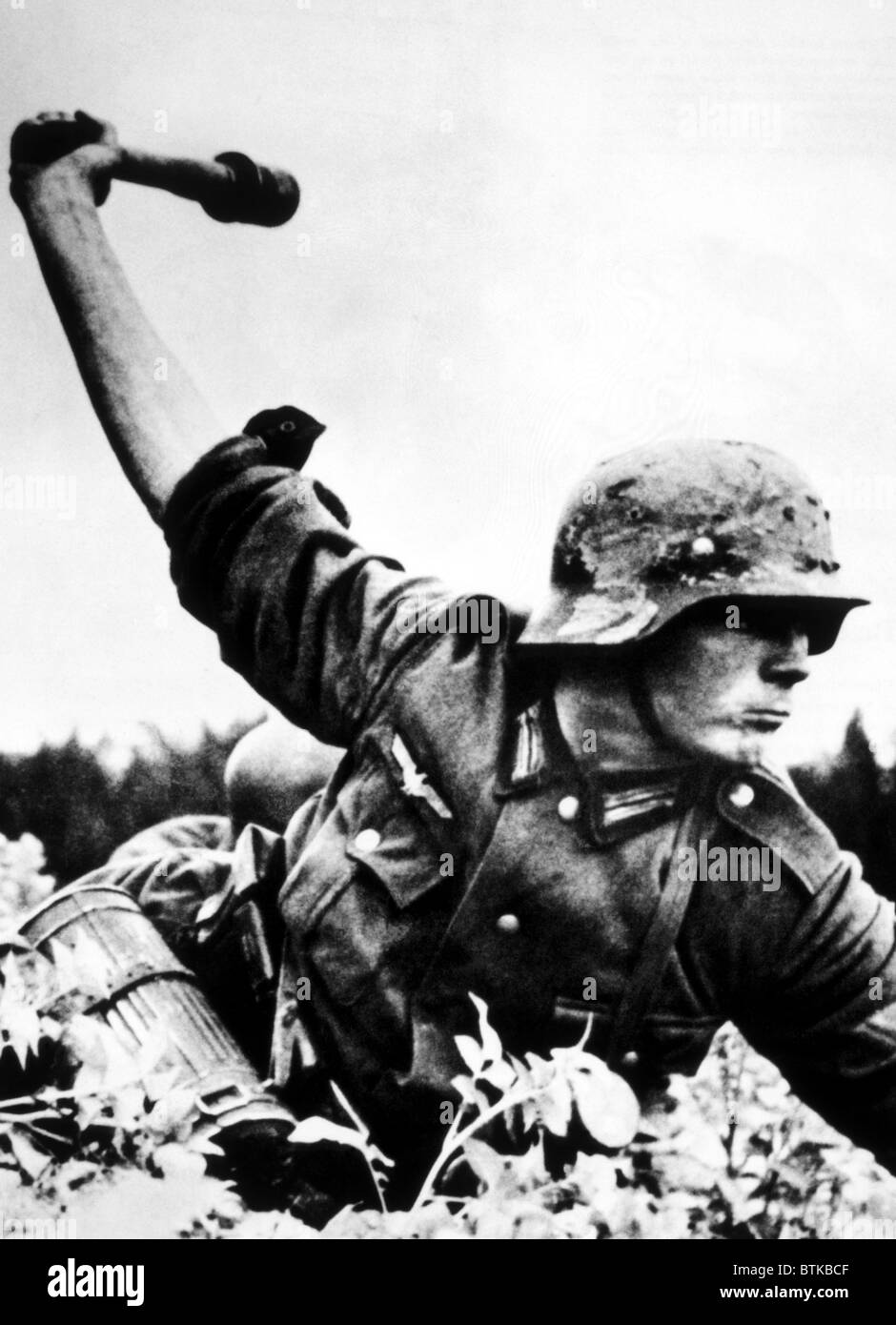 World War II, A German soldier about to threw a hand grenade in Poland, 1939 Stock Photo