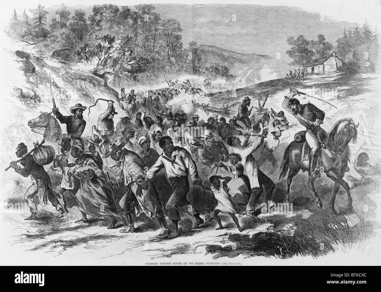 In late 1862, Rebel cavalry officers drove Virginia slaves south, away from Union Army lines to prevent their escape. Slaves were 'refugeed' throughout the Civil War, often under brutal conditions, handcuffed or chained together in coffles. Stock Photo